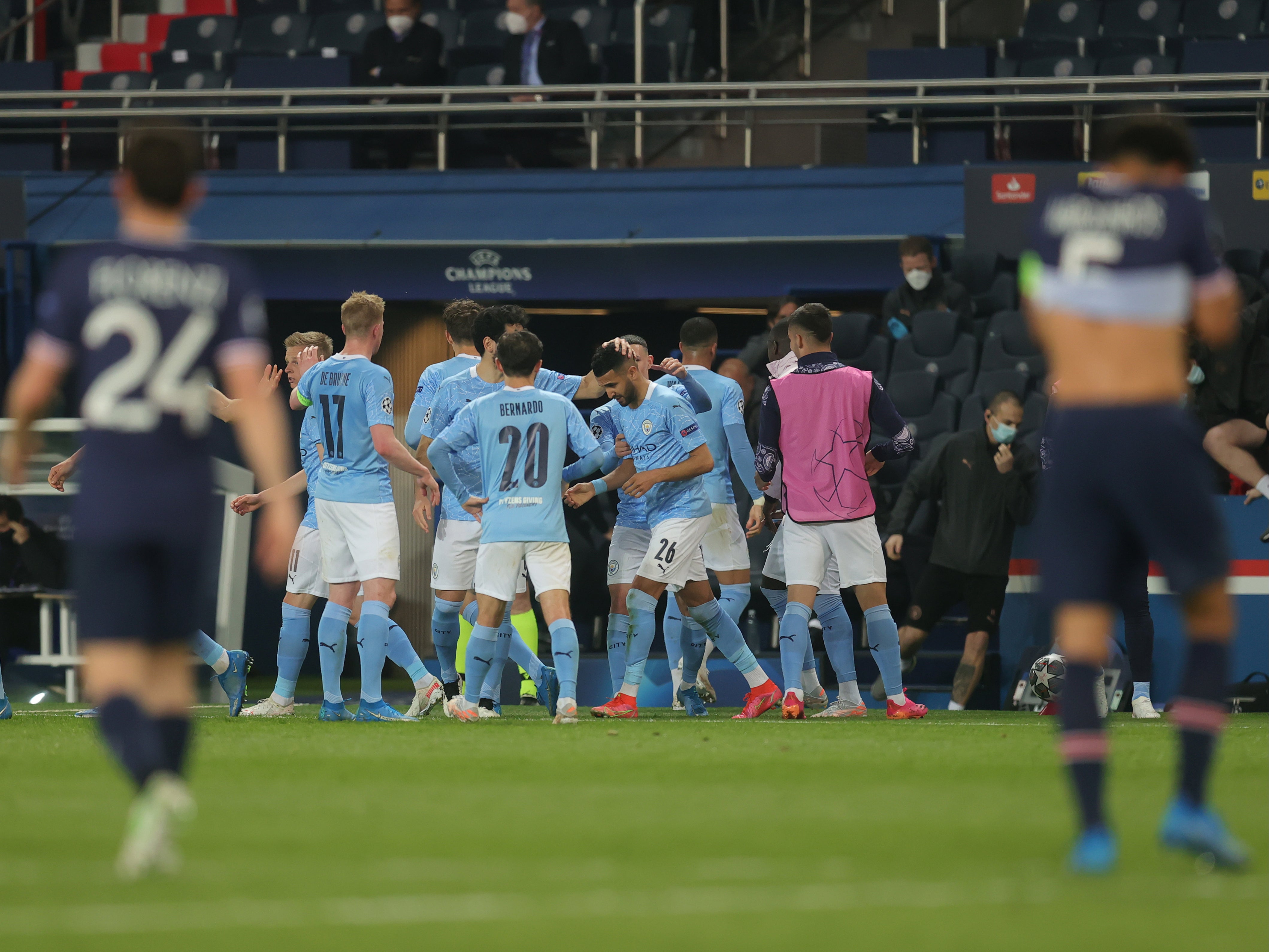 Manchester City players celebrate scoring against Paris Saint-Germain