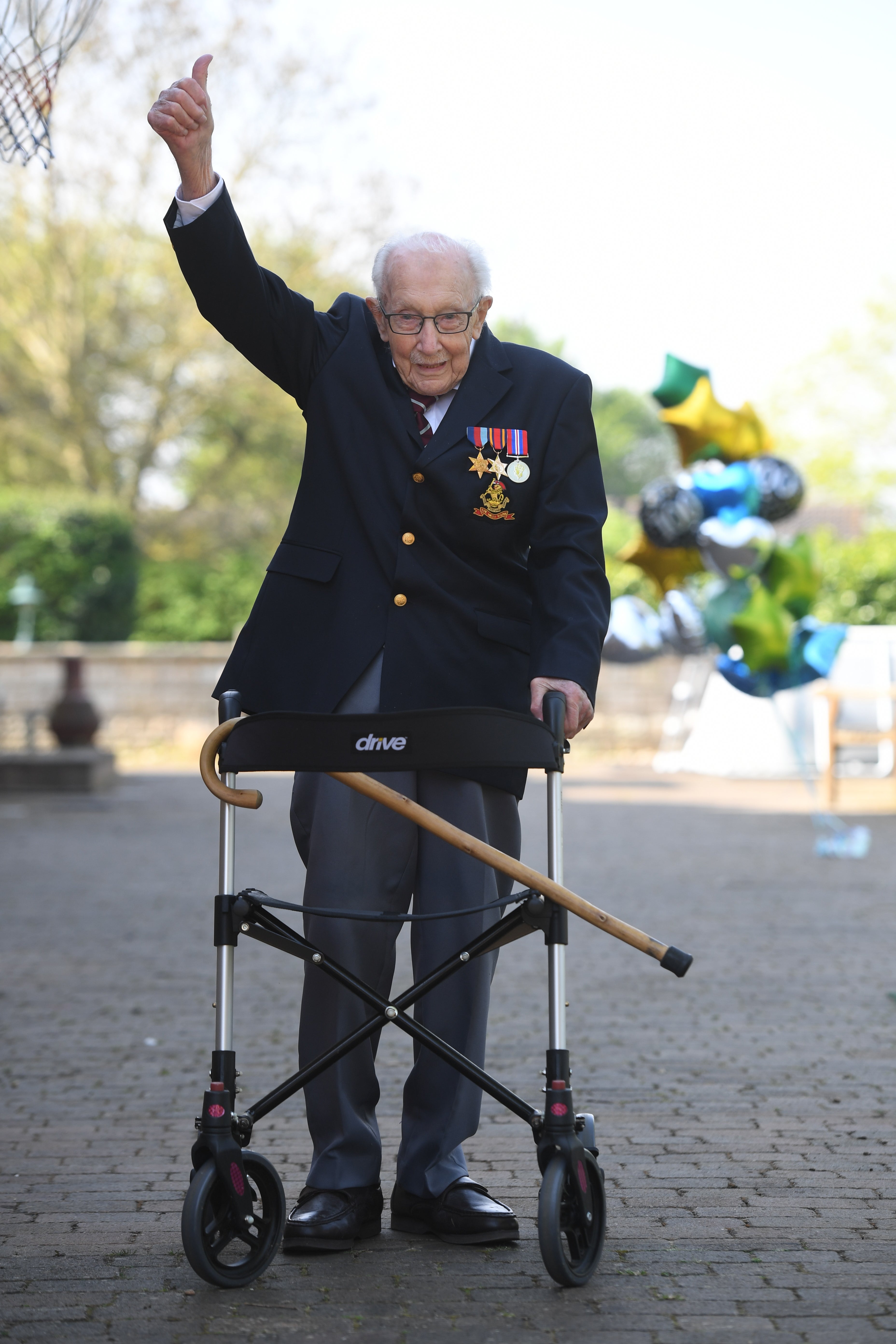 Captain Tom Moore walked 100 laps of his garden - and was watched by millions around the world