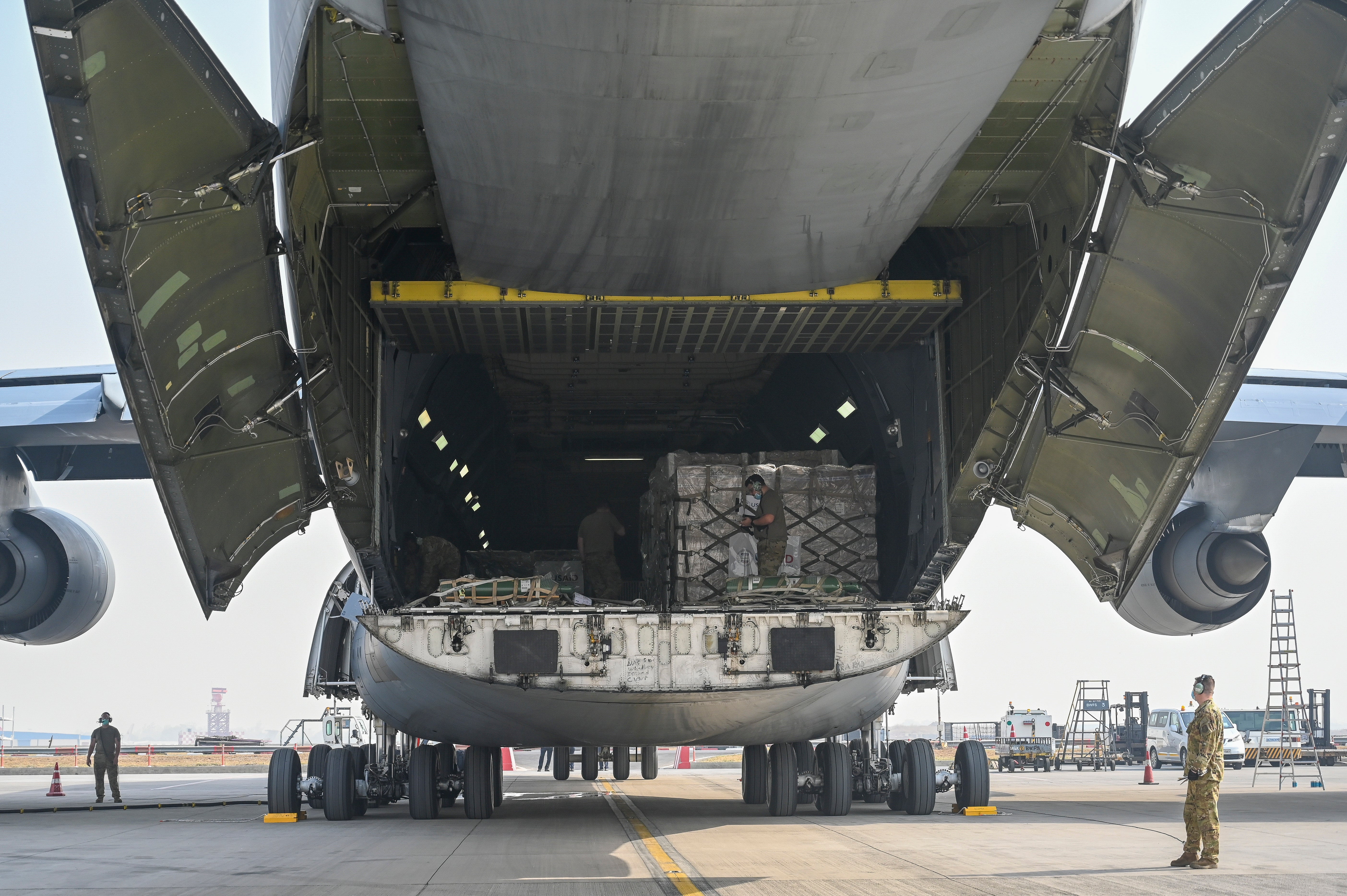 A US Air Force aircraft carrying relief supplies from the United States in the wake of India’s COVID-19 situation arrives at the Indira Gandhi International Airport