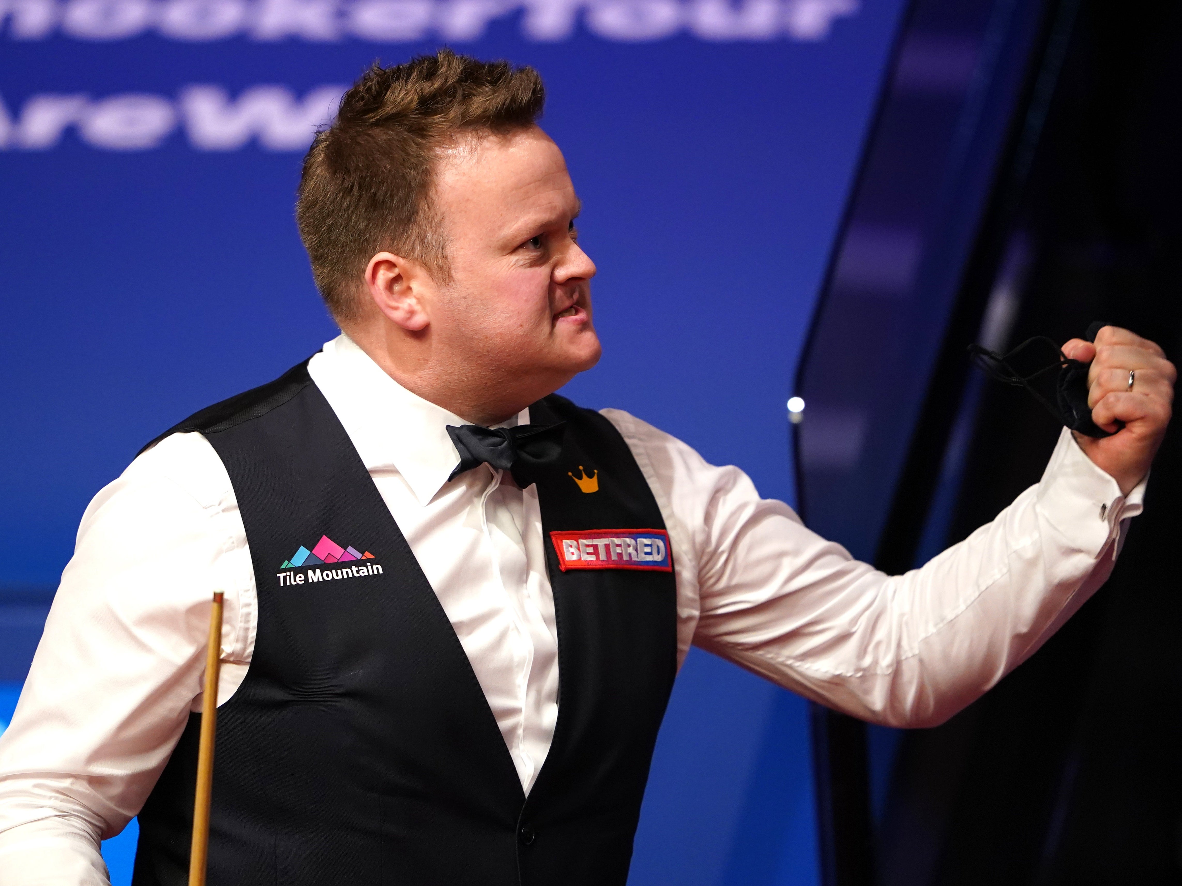 Shaun Murphy celebrates his victory over Kyren Wilson