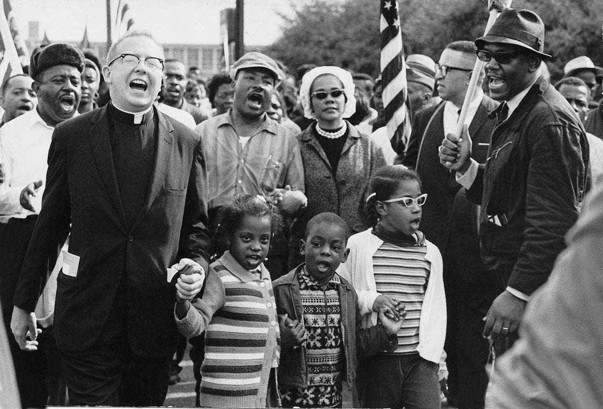 Civil rights movement co-founder Ralph David Abernathy with Martin Luther King and his wife, leading the Selma to Montgomery march in 1965