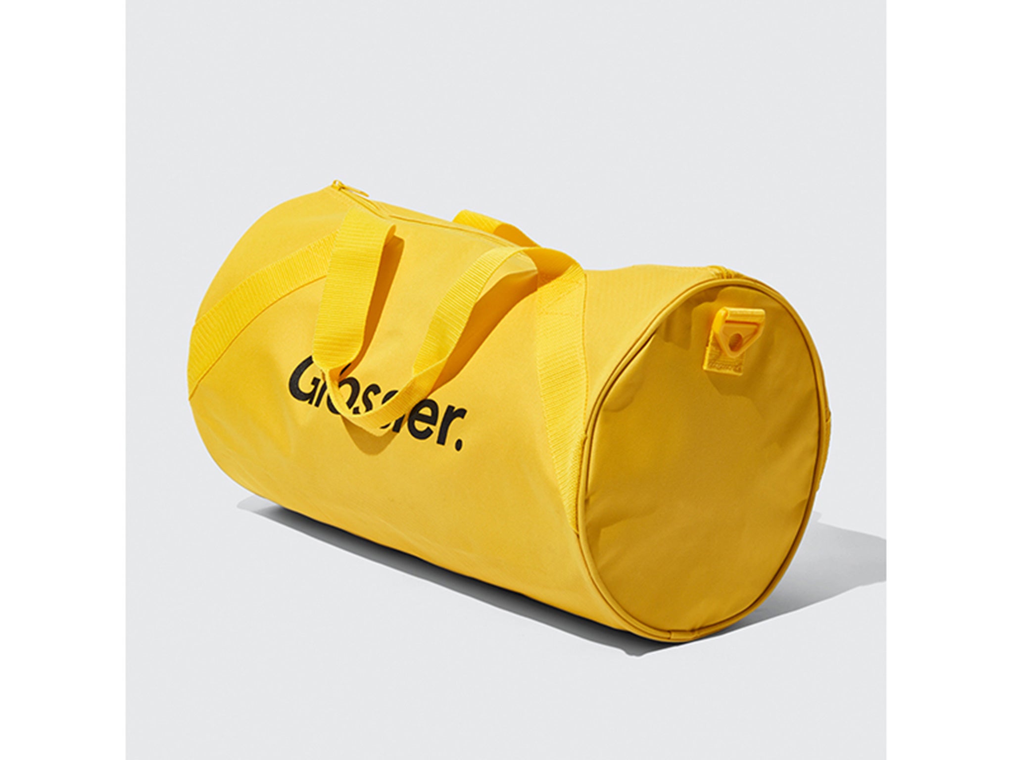 Glossier sunshine yellow duffel bag