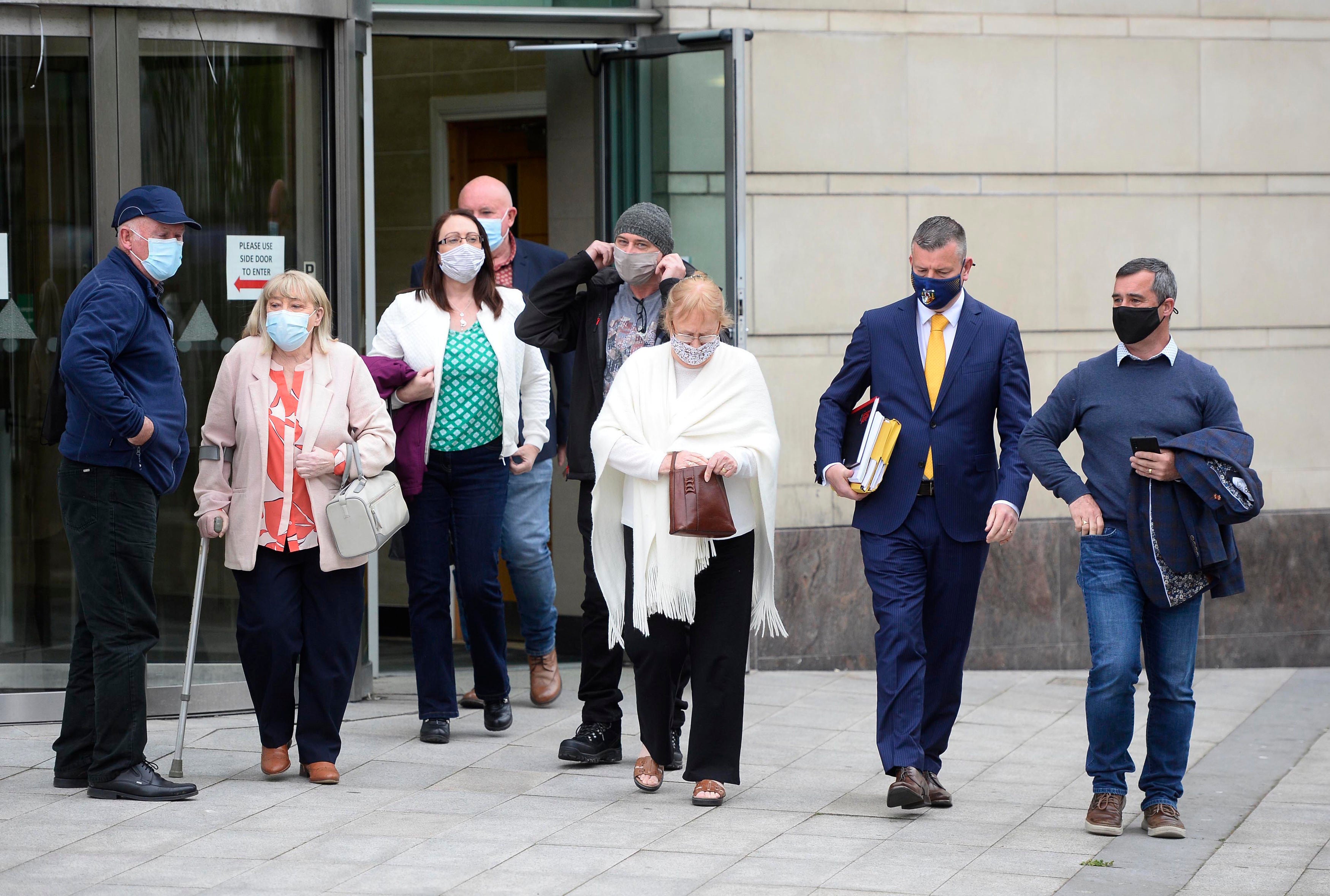 Members of Joe McCann’s family and their legal team leave Belfast Crown Court after the acquittal