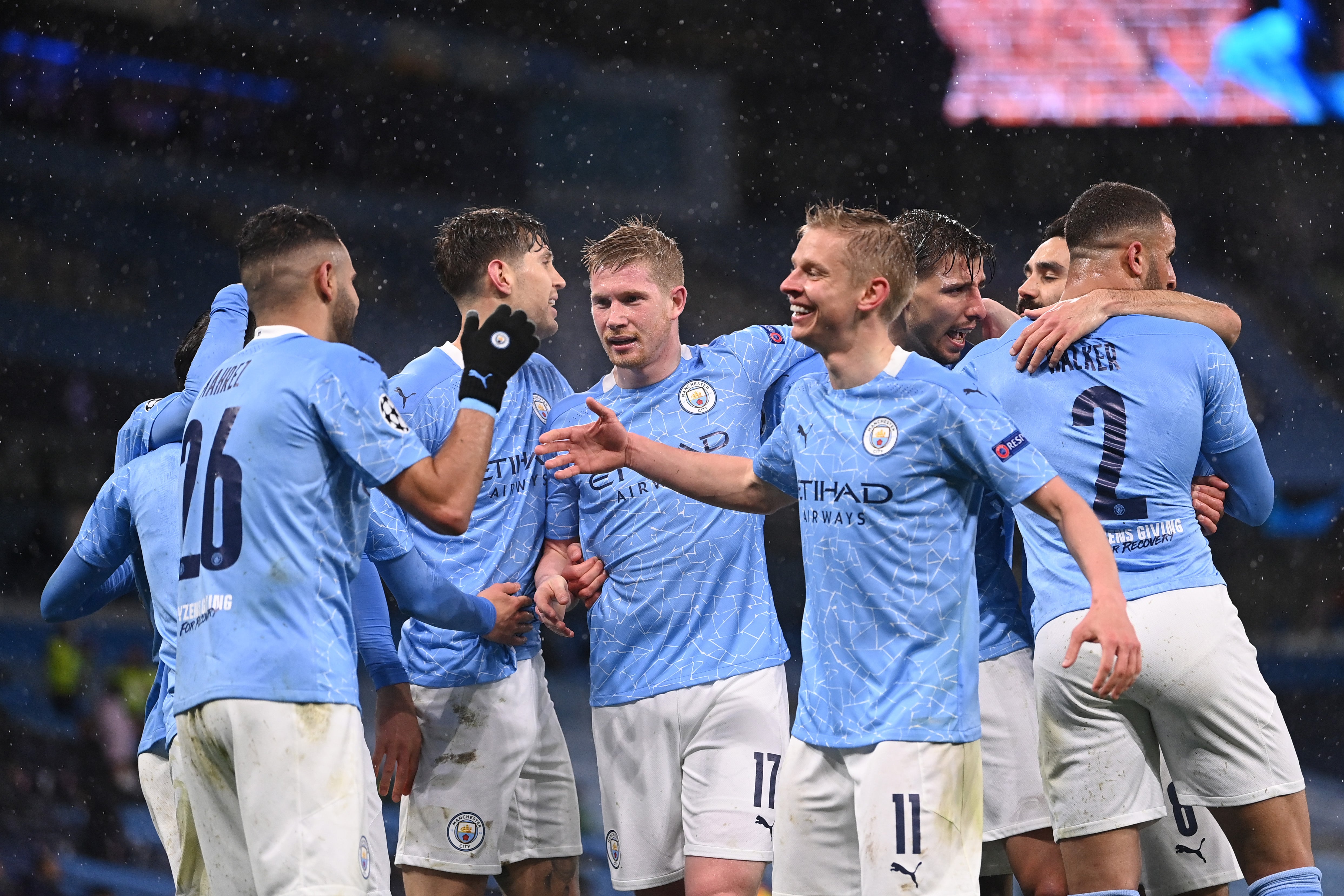 Manchester City’s players celebrate Riyad Mahrez’s second goal