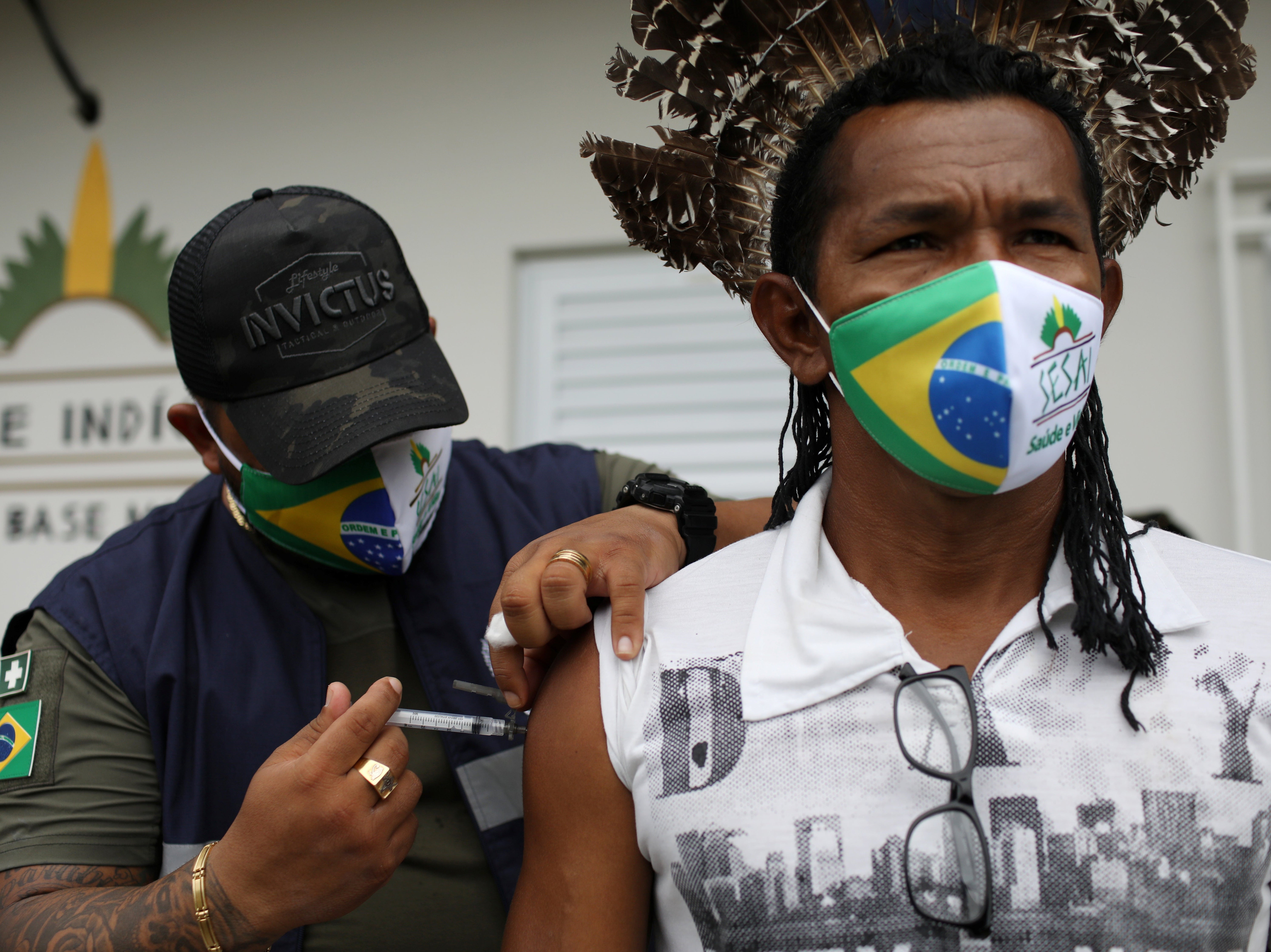 Healthcare workers have reportedly been confronted by crowds armed with bows and arrows while attempting to deliver the Covid-19 vaccine to an indigenous community in Brazil