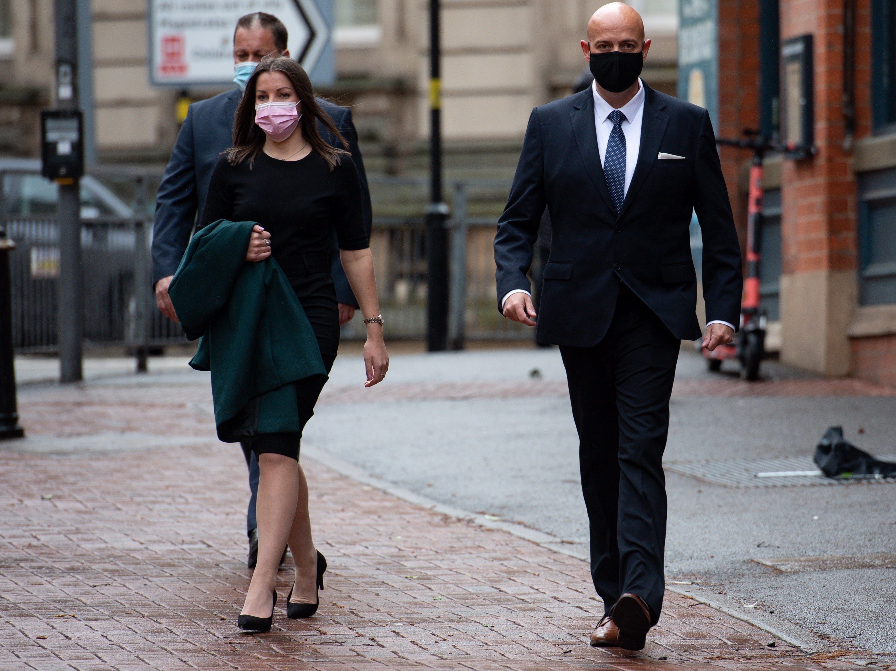 West Mercia Police Constables Mary Ellen Bettley-Smith and Benjamin Monk (right) arrive at Birmingham Crown Court