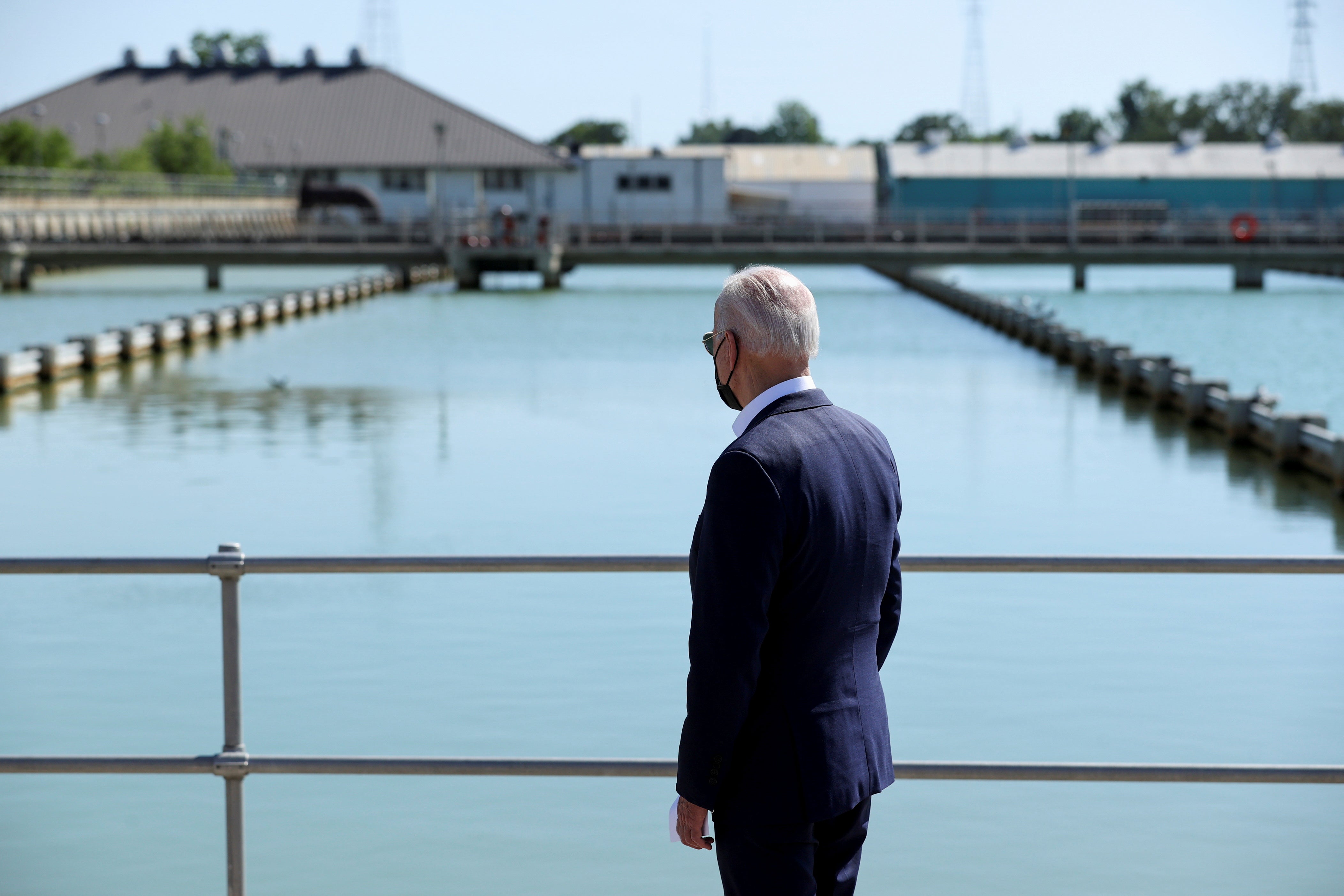 Joe Biden looks out at the New Orleans Sewerage & Water Board’s facility on 6 May.