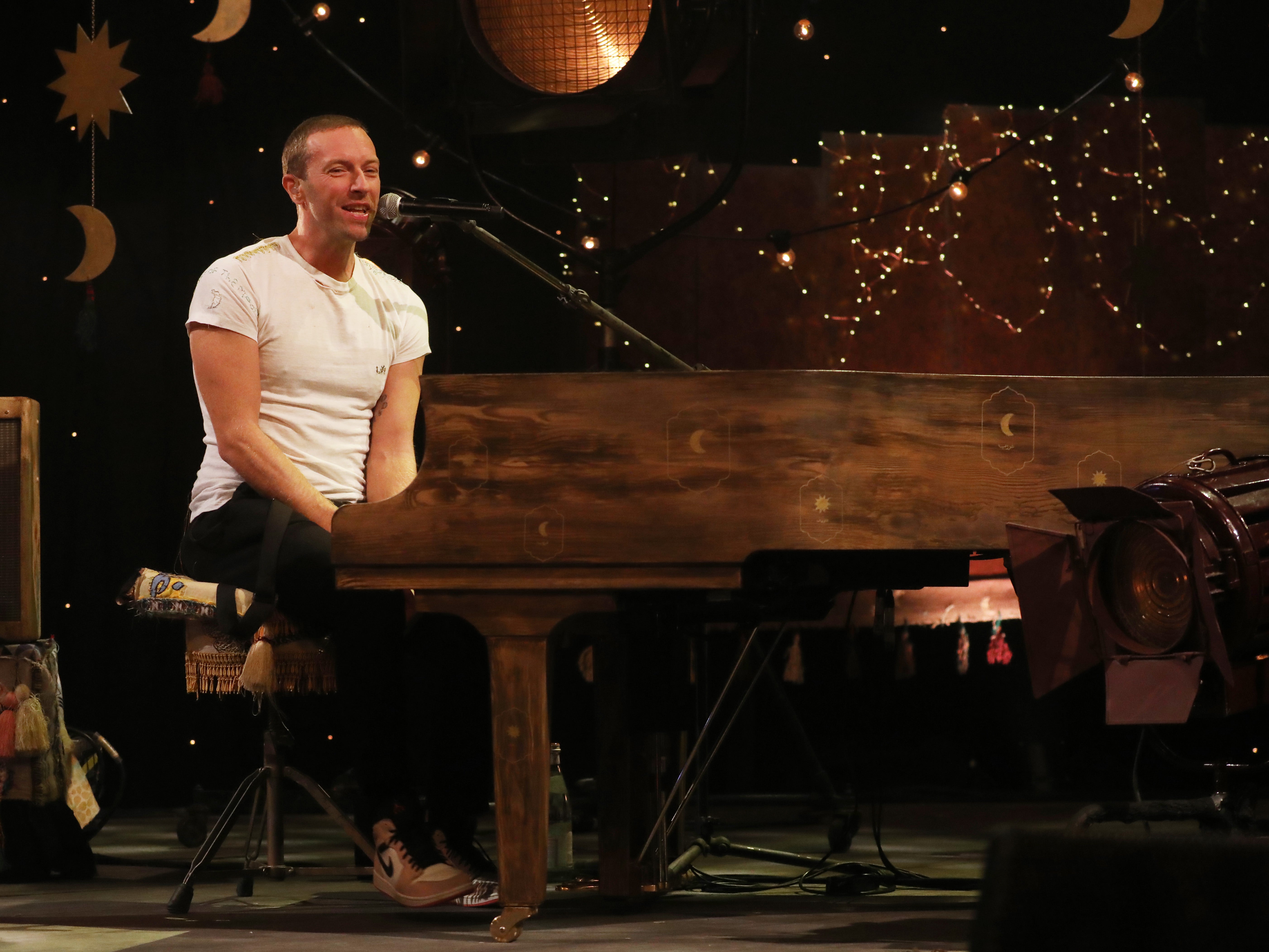 ‘A Tesco Finest Thom Yorke’ – Chris Martin performing during a Coldplay gig