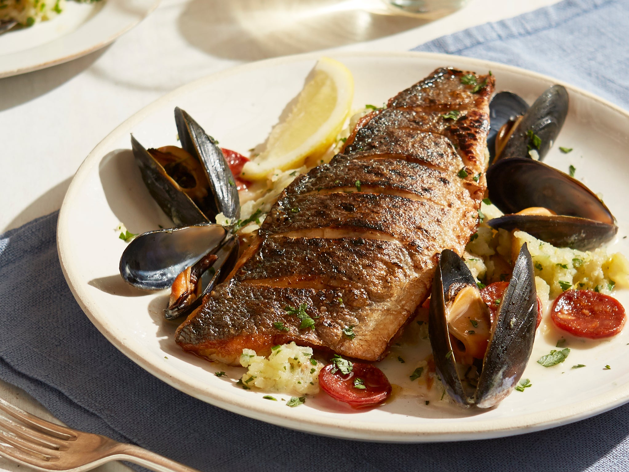 Grilled sea bass and mussels