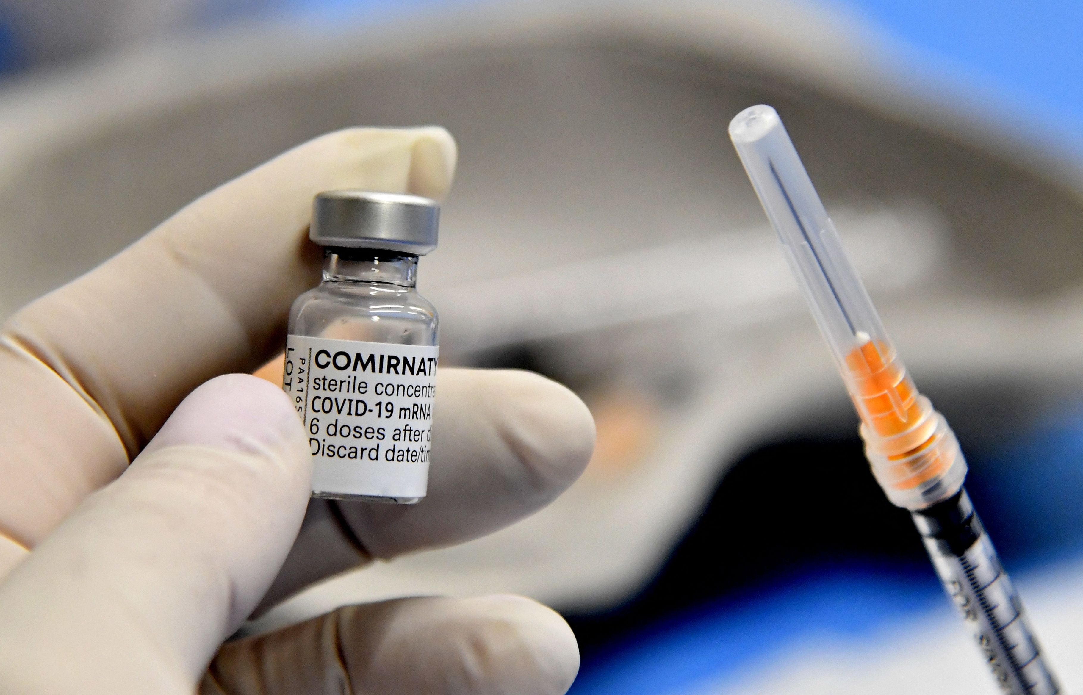 Representative: A medical worker holds a syringe and a vial of the Comirnaty vaccine by Pfizer-BioNTech against Covid-19 on 22 April 2021 at the San Giovanni Addolorata hospital in Rome