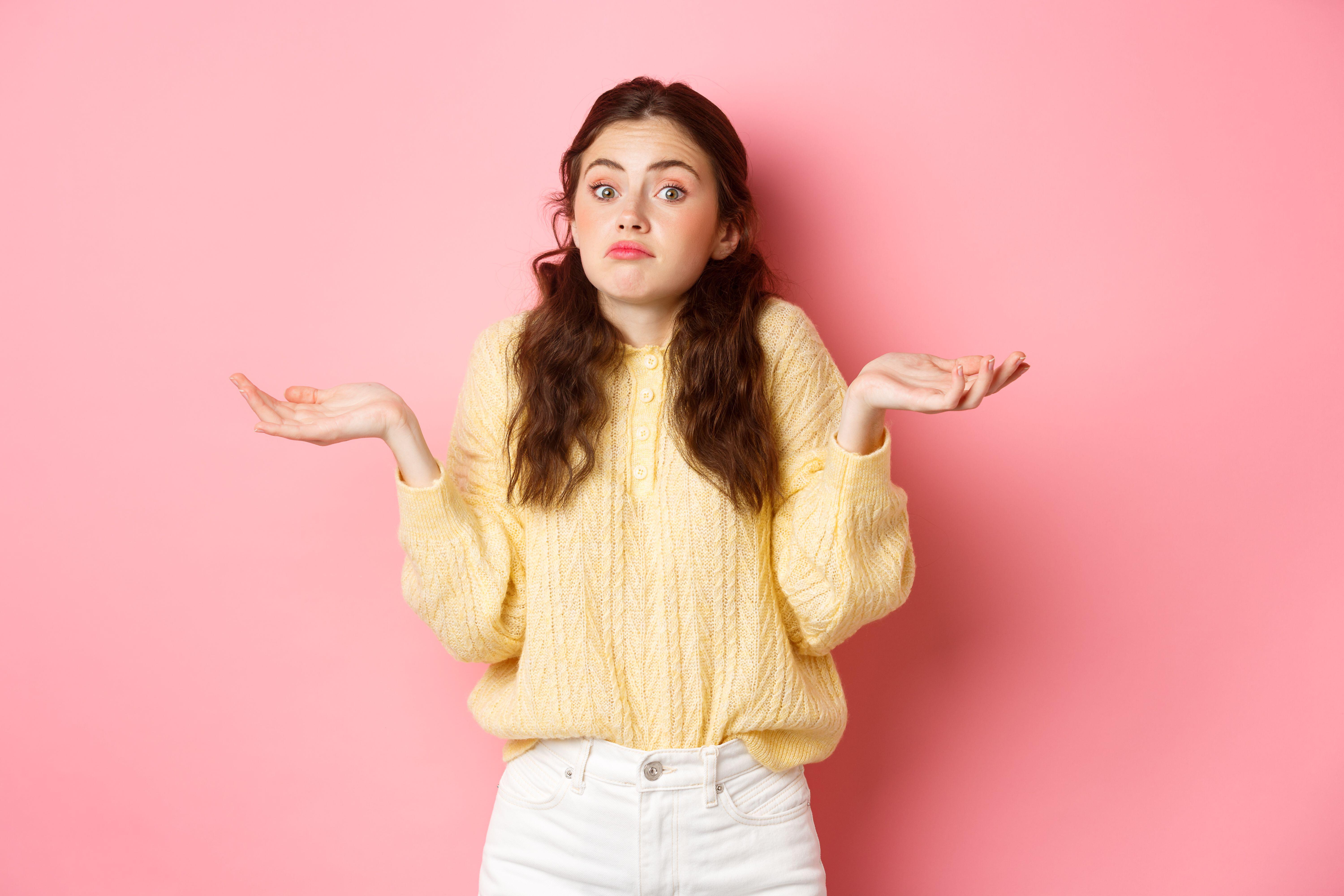 Woman shrugging