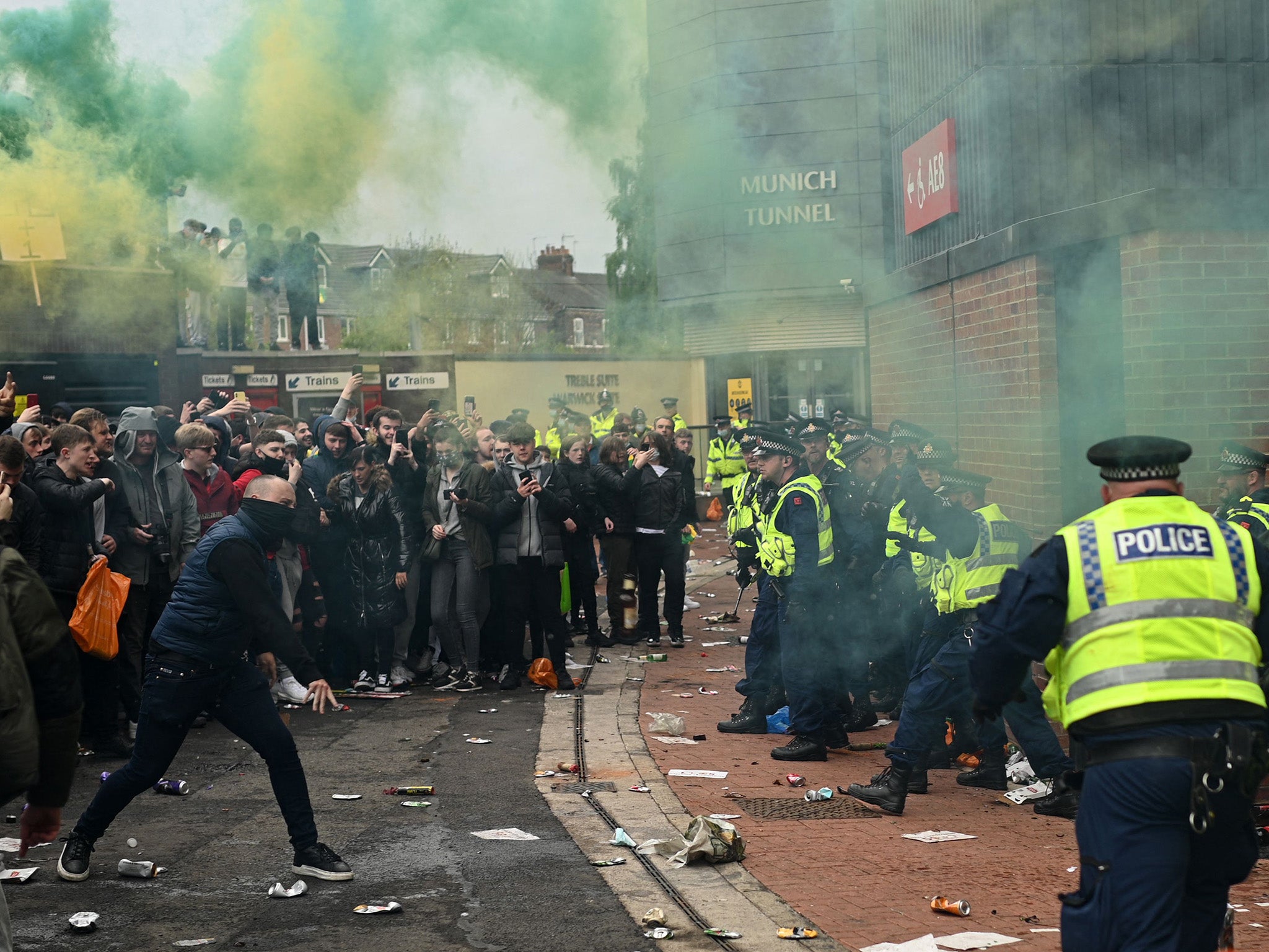 Supporters clash with police during a protest against Manchester United’s owners