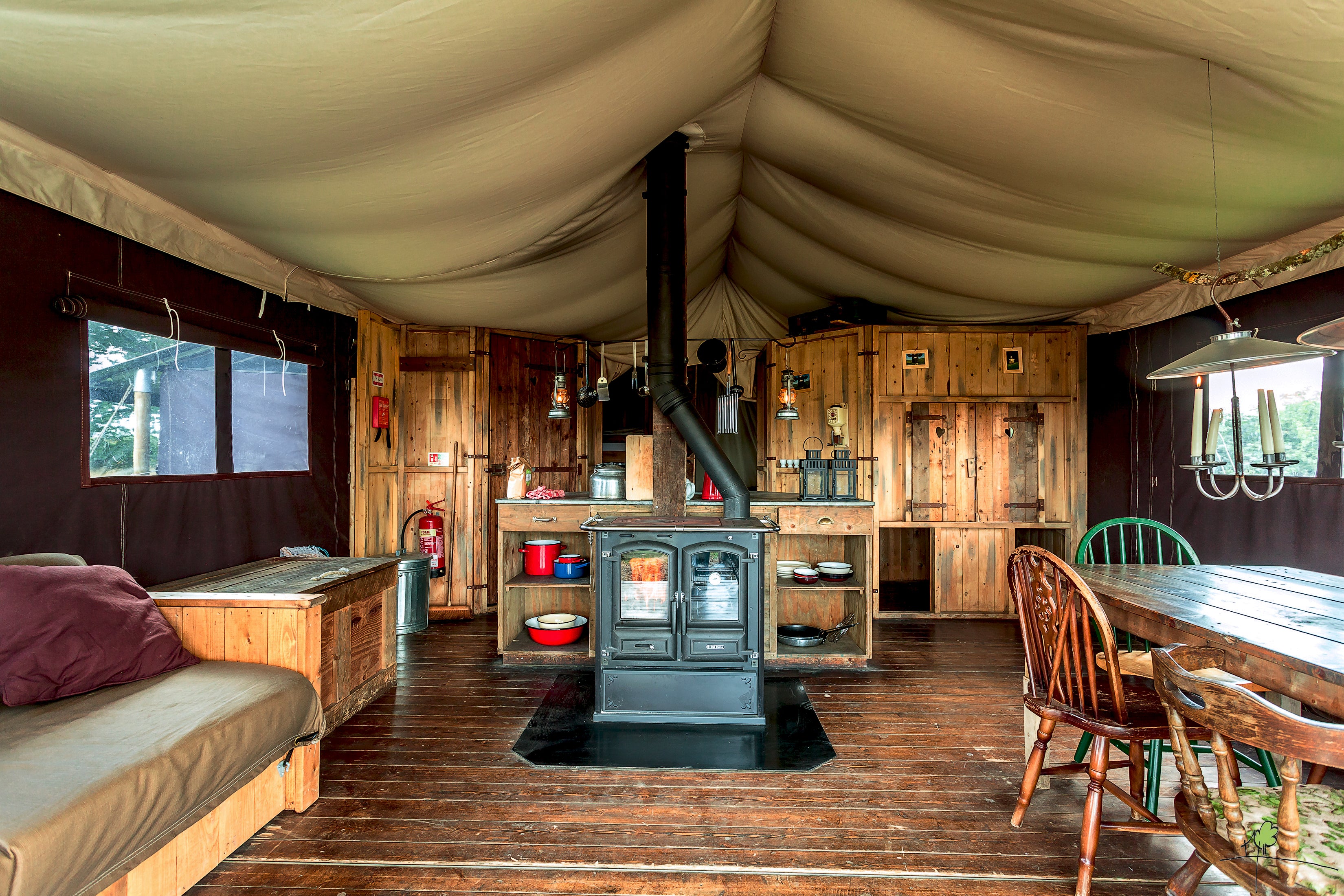 The fully furnished kitchen with wood-burning stove