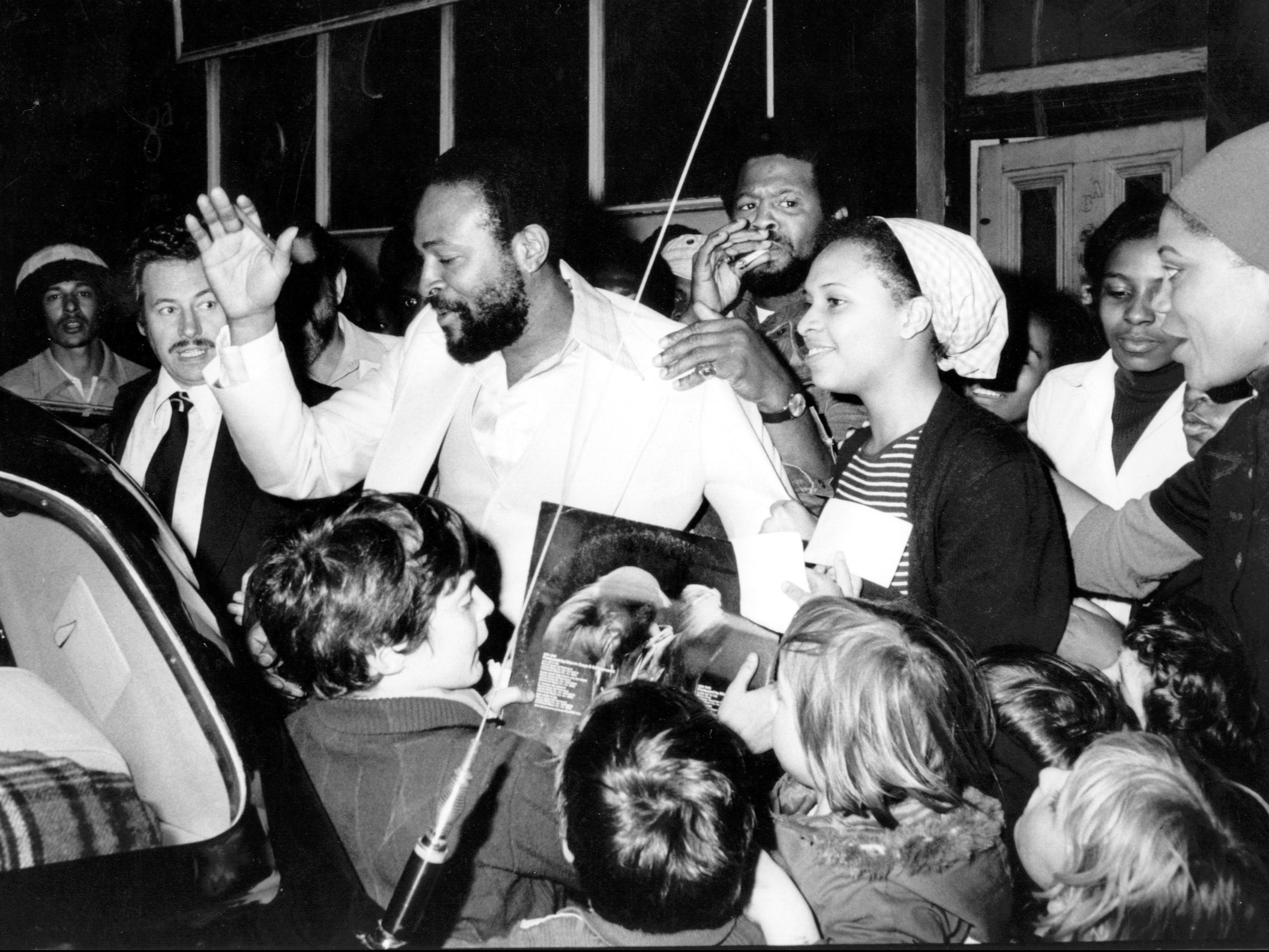 Gaye is mobbed by admirers as he leaves west London’s Mangrove Cafe in 1976