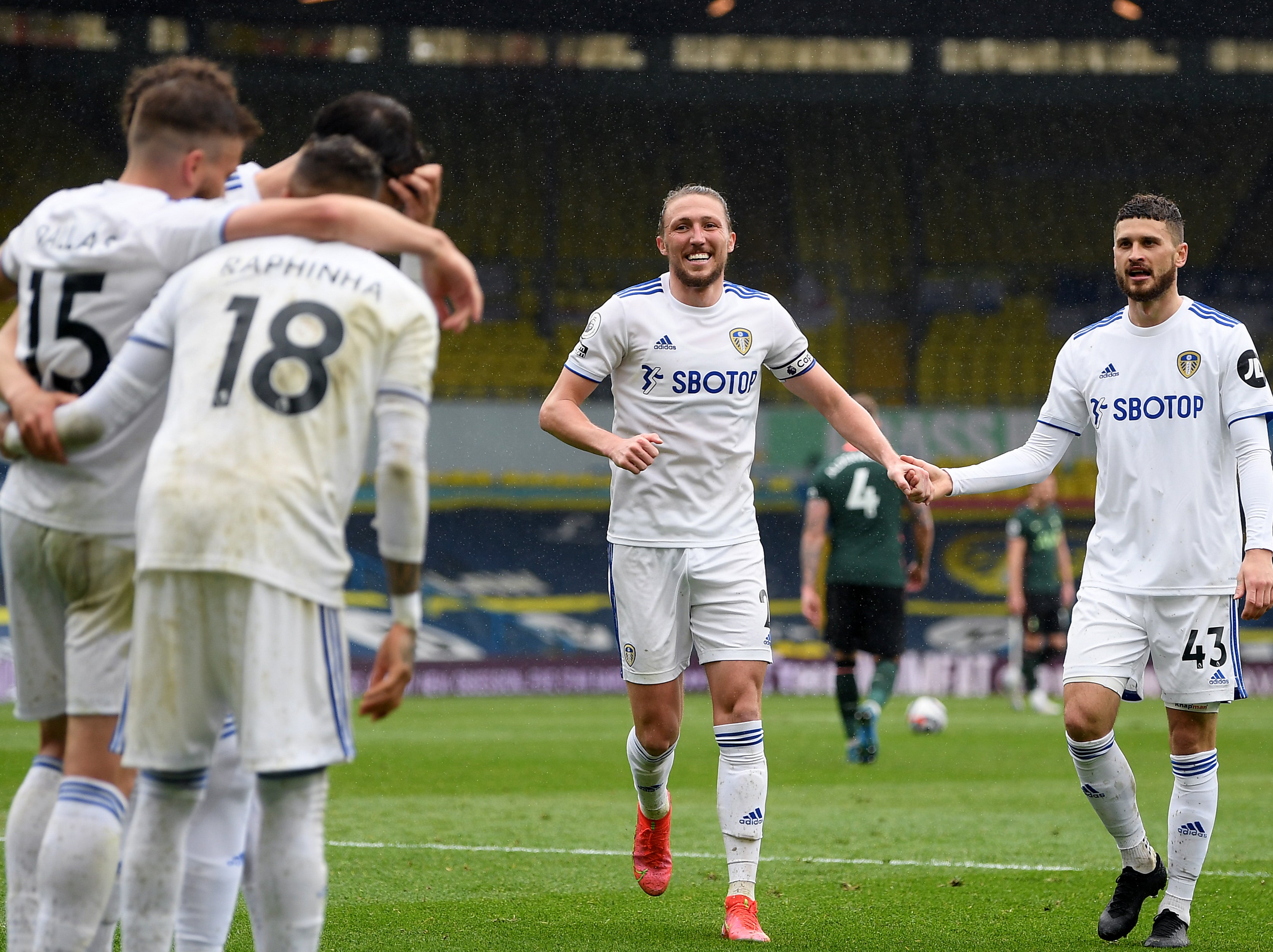 Leeds players celebrate their victory over Tottenham