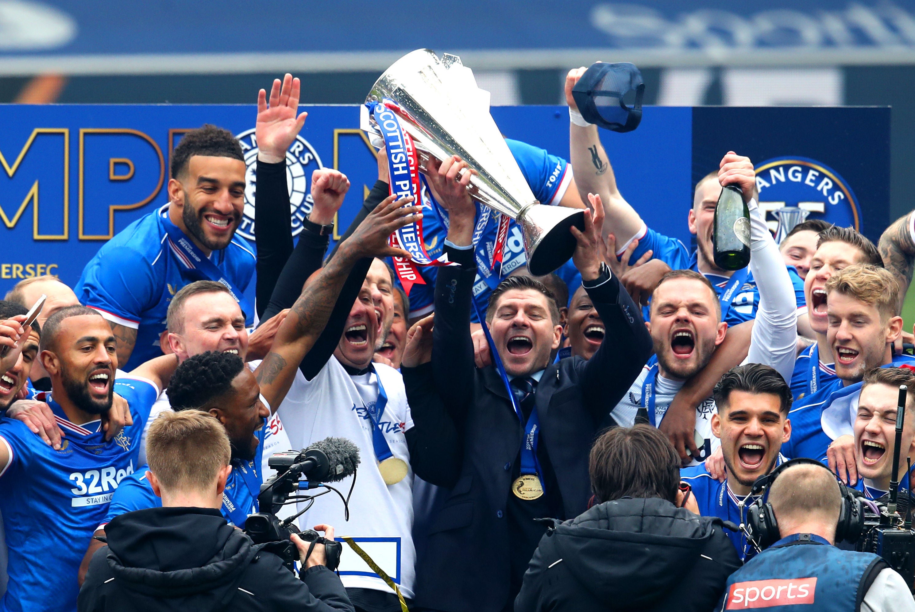 Rangers celebrate with the Premiership trophy