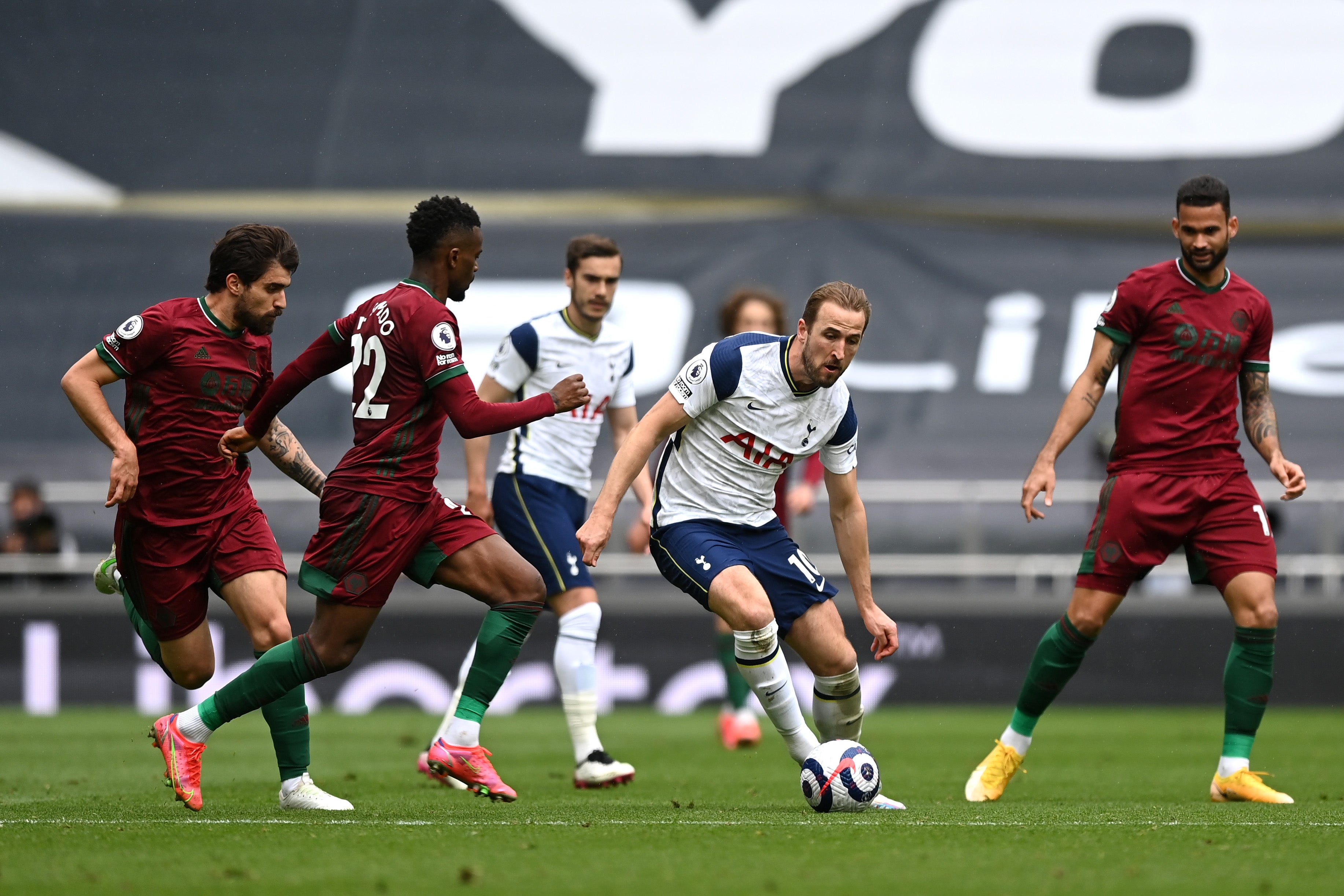 Harry Kane of Tottenham Hotspur looks to get past Nelson Semedo of Wolverhampton Wanderers