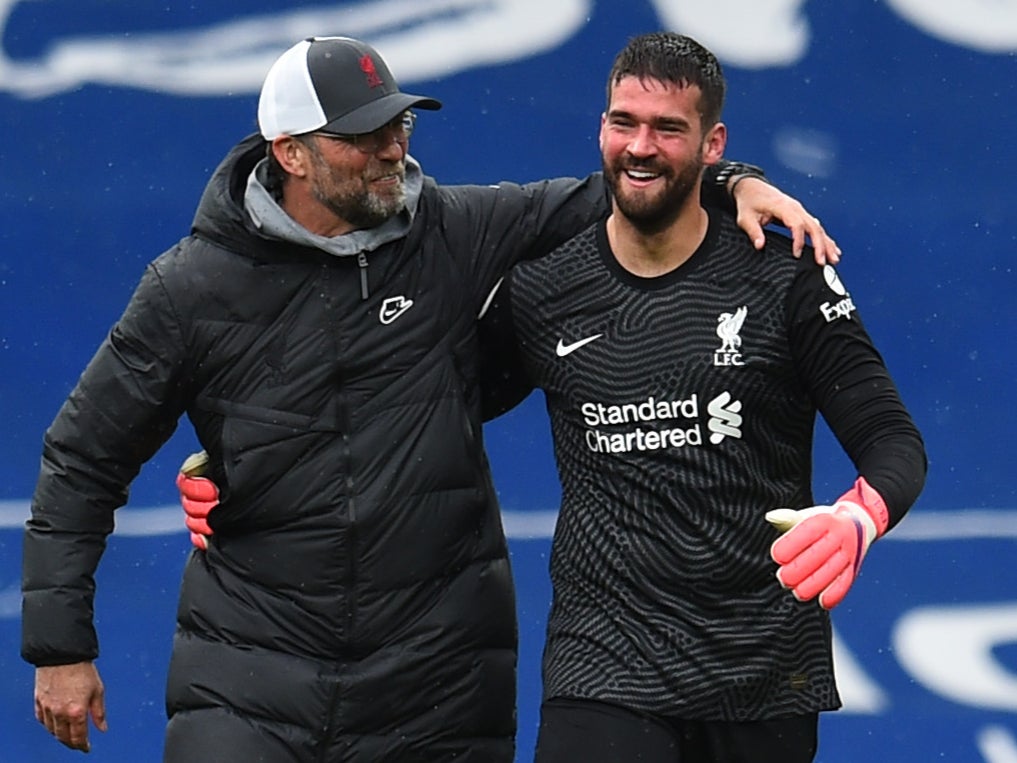 Jurgen Klopp celebrates with Alisson