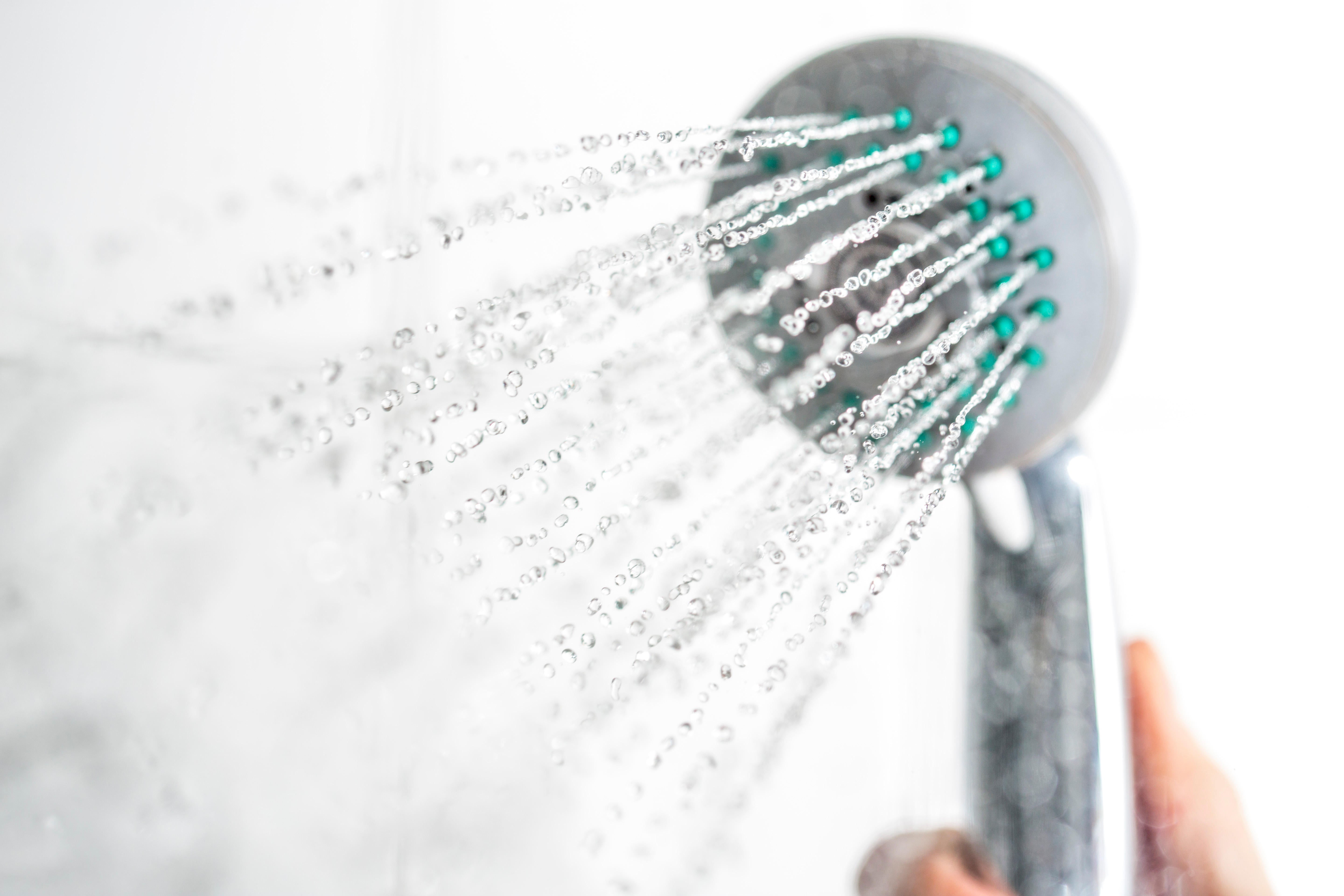 Water running out of a shower head.