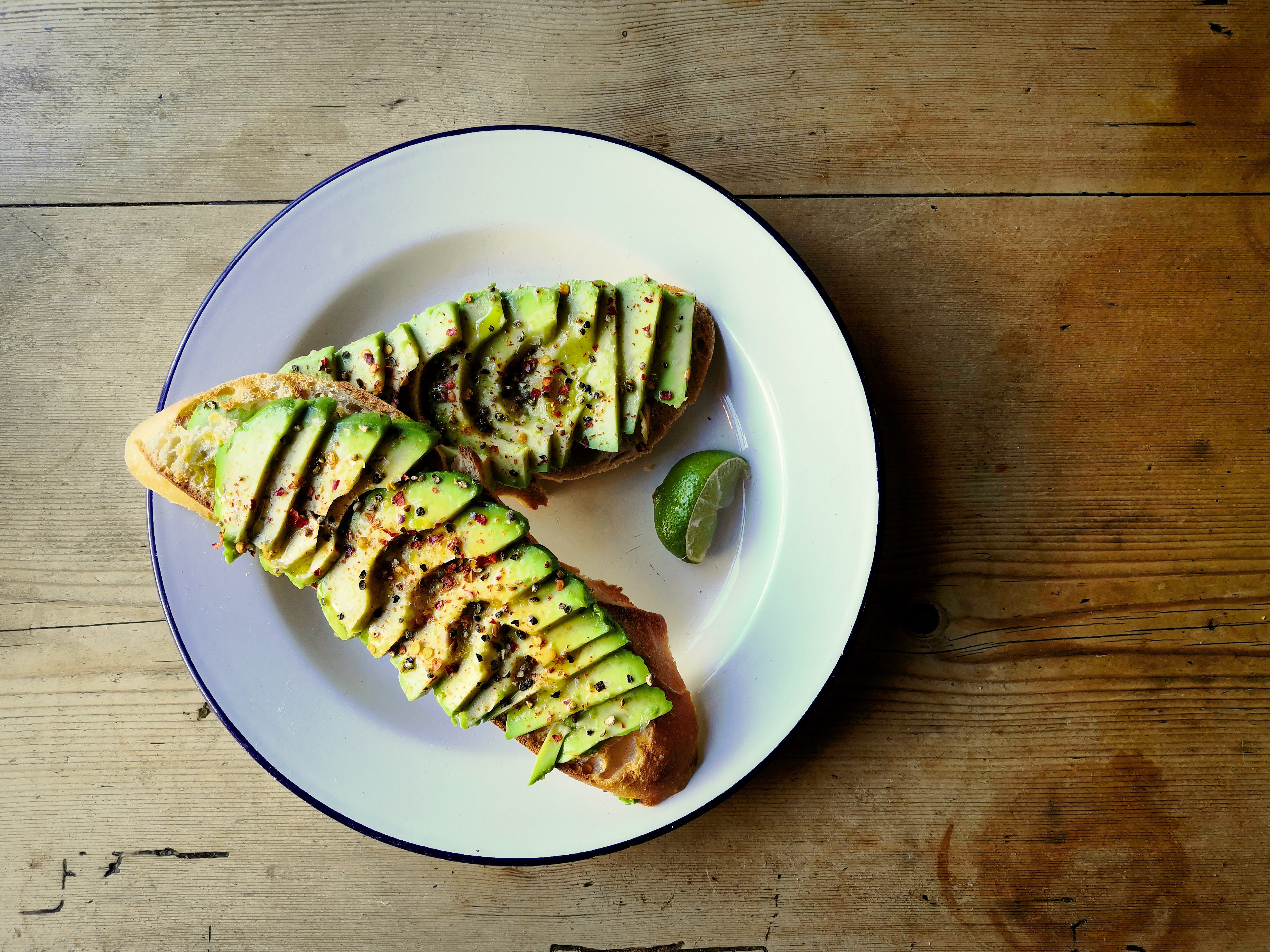 Sliced avocado on sour dough bread