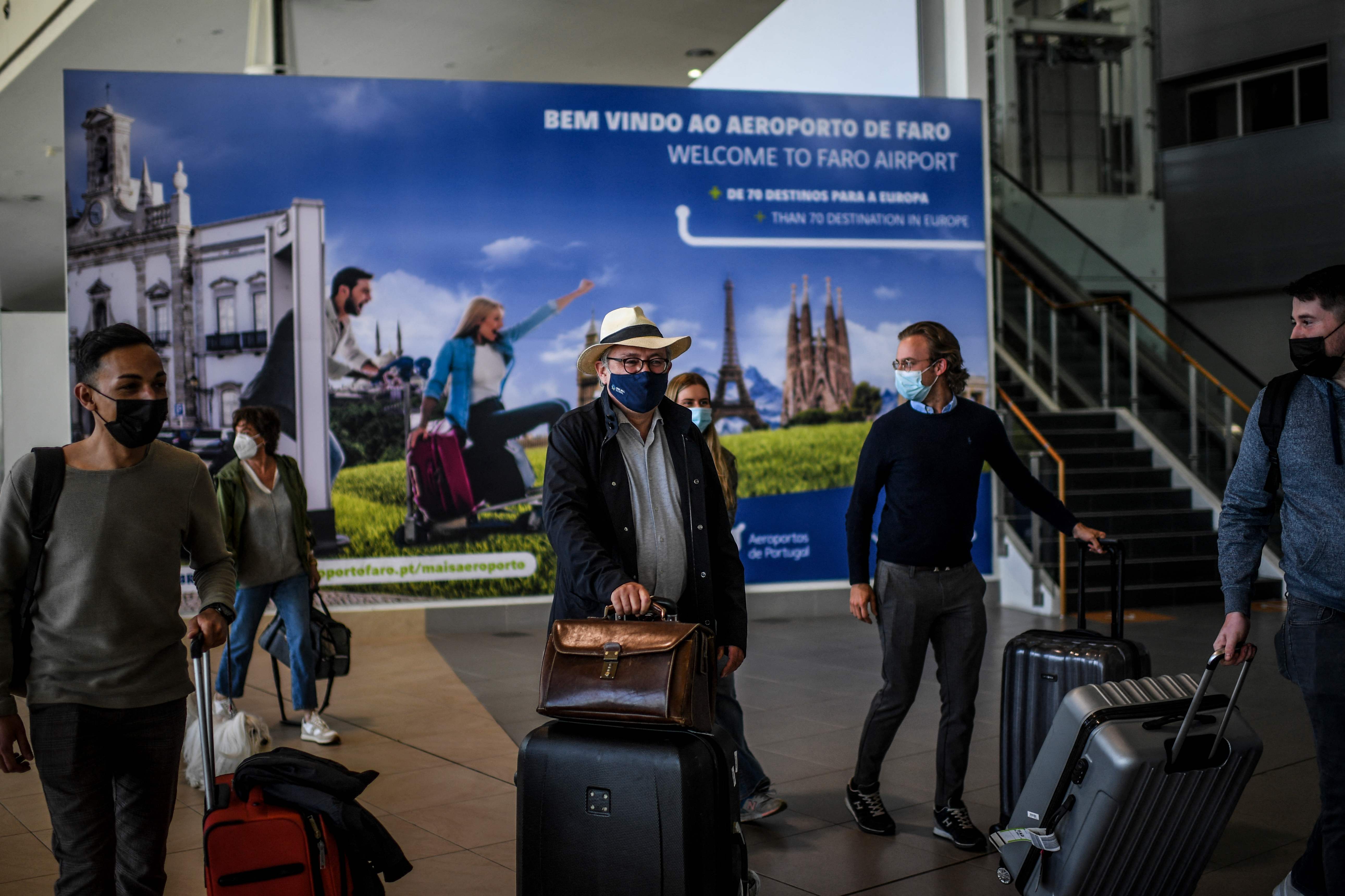 British holidaymakers arrive at Faro airport in Portugal’s Algarve