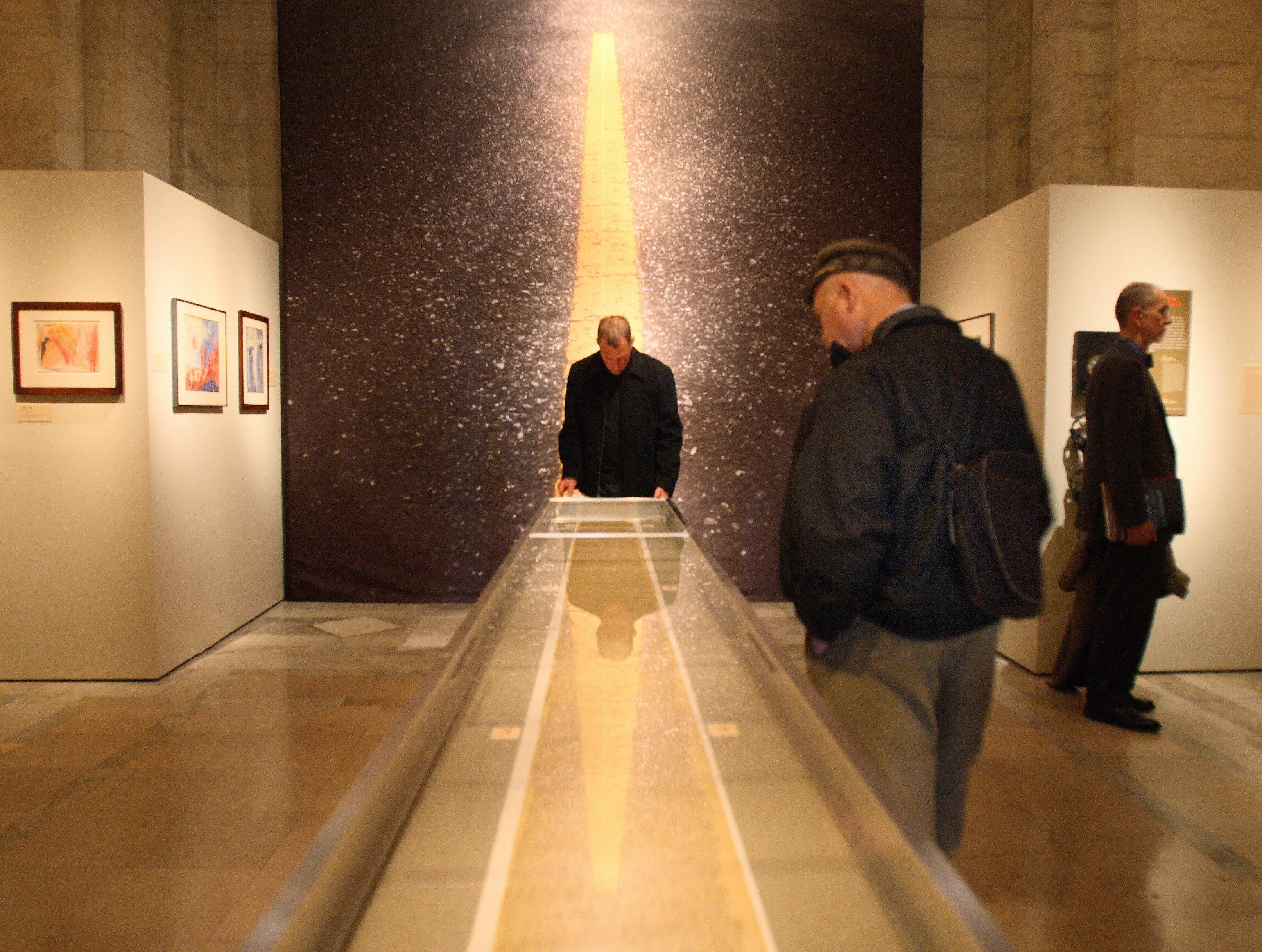 Spectators view a 60ft section of the 120ft ‘On the Road’ scroll on display at an exhibit of works by US beat writer Jack Kerouac, at the New York Public Library, November 2007