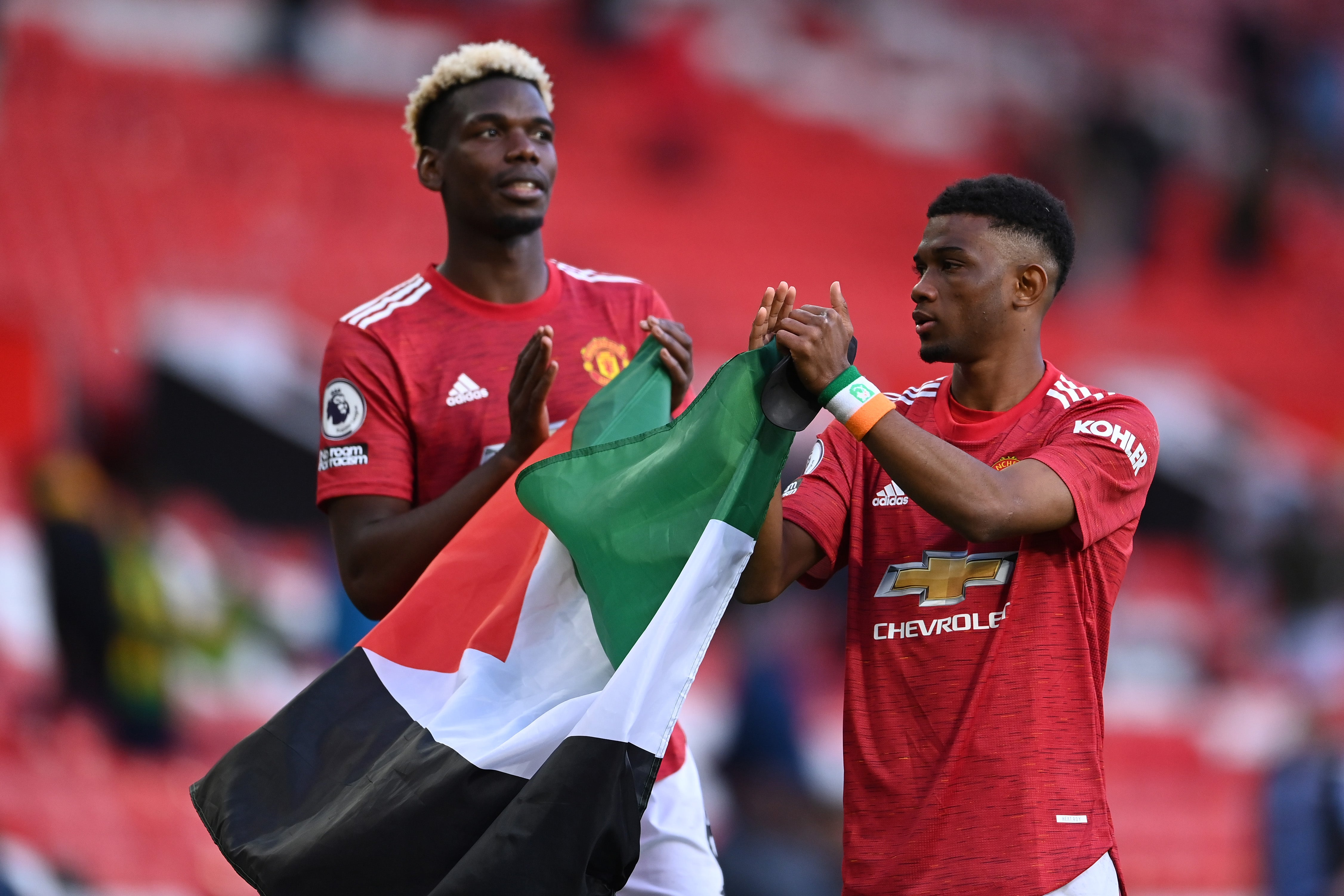 Paul Pogba and Amad Diallo held up the Palestine flag at full-time