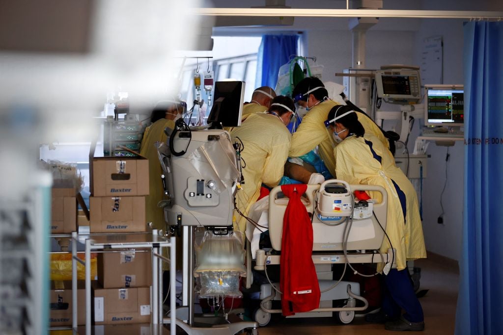 Emergency staff help prone a Covid-19 patient in the Intensive Care Unit at Queen Alexandra Hospital in Portsmouth, on 23 March, 2021