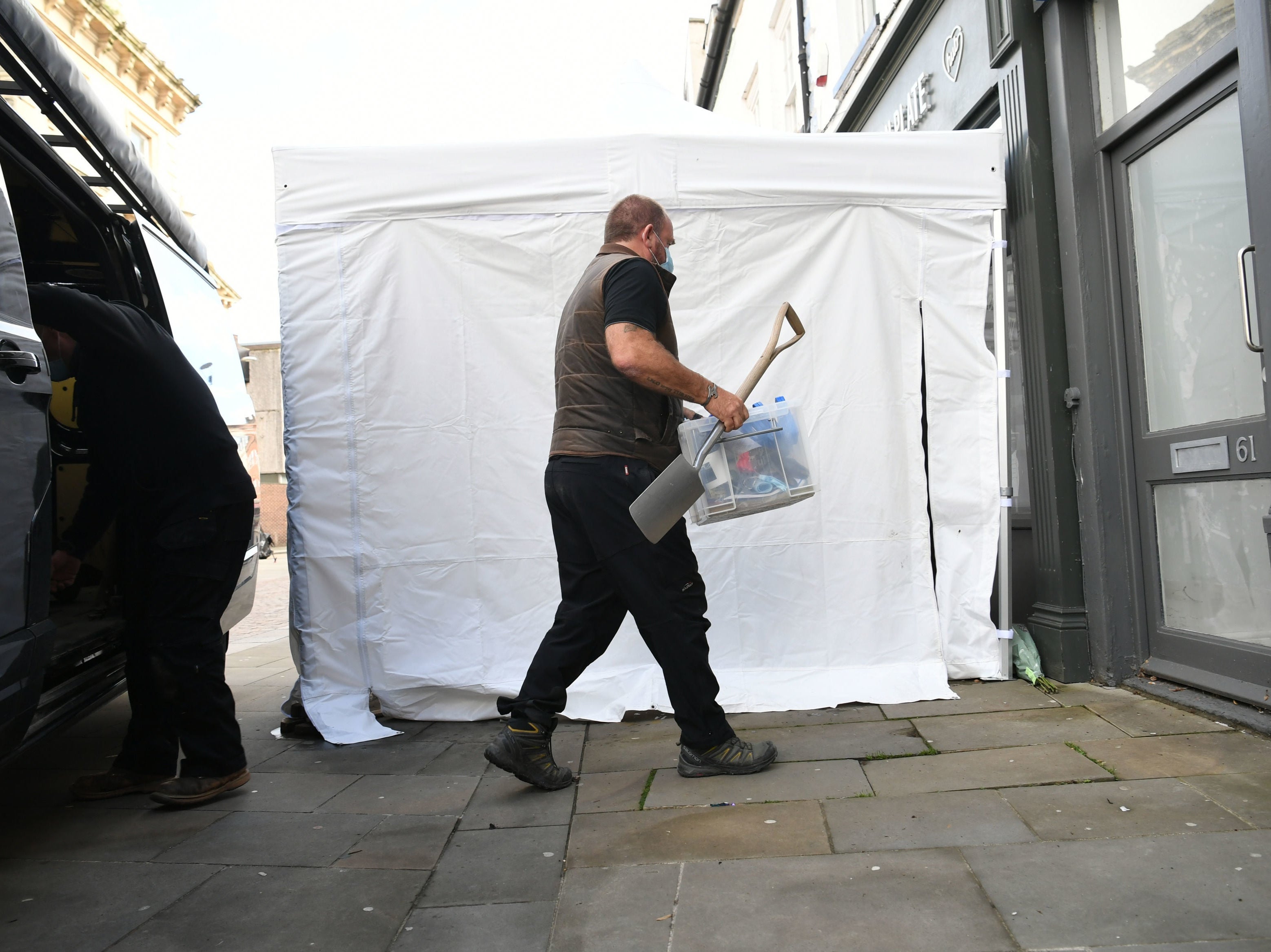 Contractors arrive to begin excavation work at The Clean Plate cafe in Gloucester