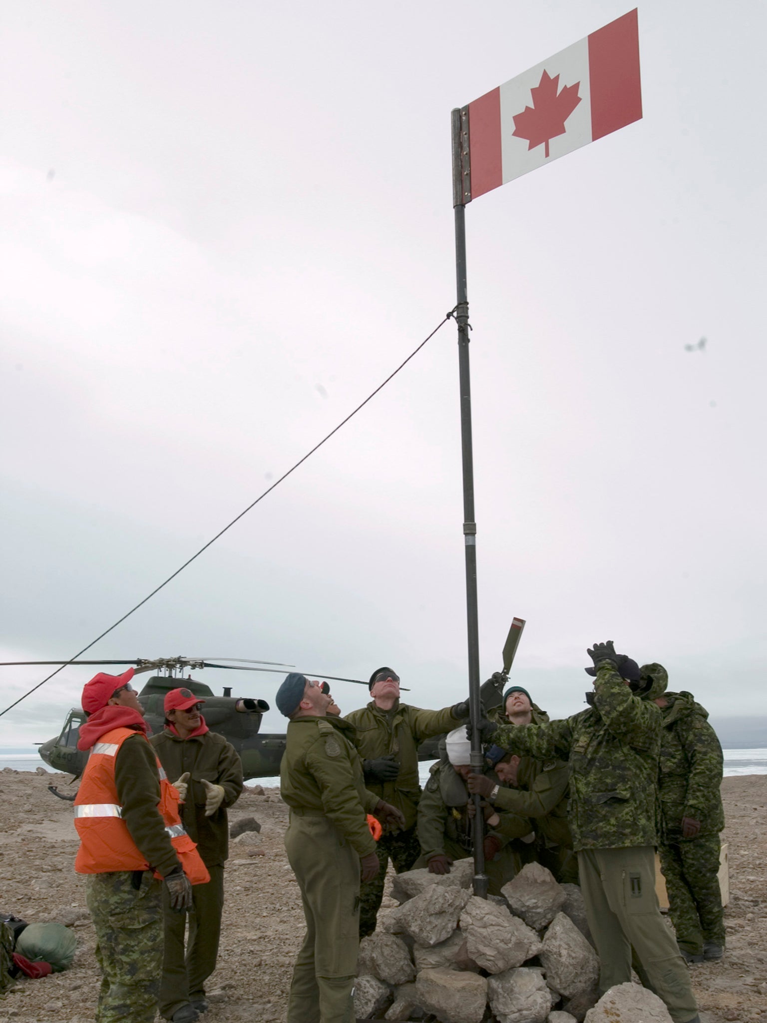 Officers from the Canadian Forces Northern Area conduct a sovereignty patrol on Hans Island, as part of Operation Hurricane