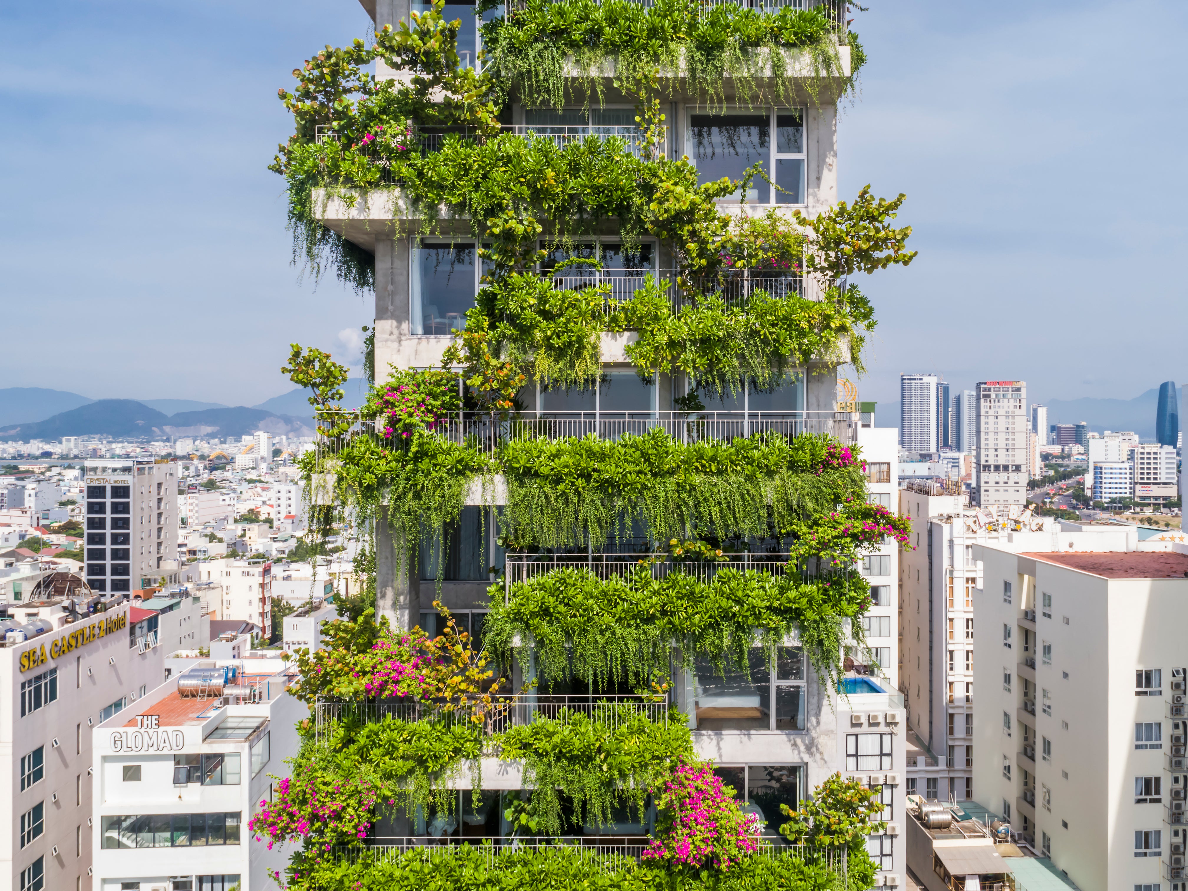 Chicland Hotel’s front-facing balconies overflow with tropical plants