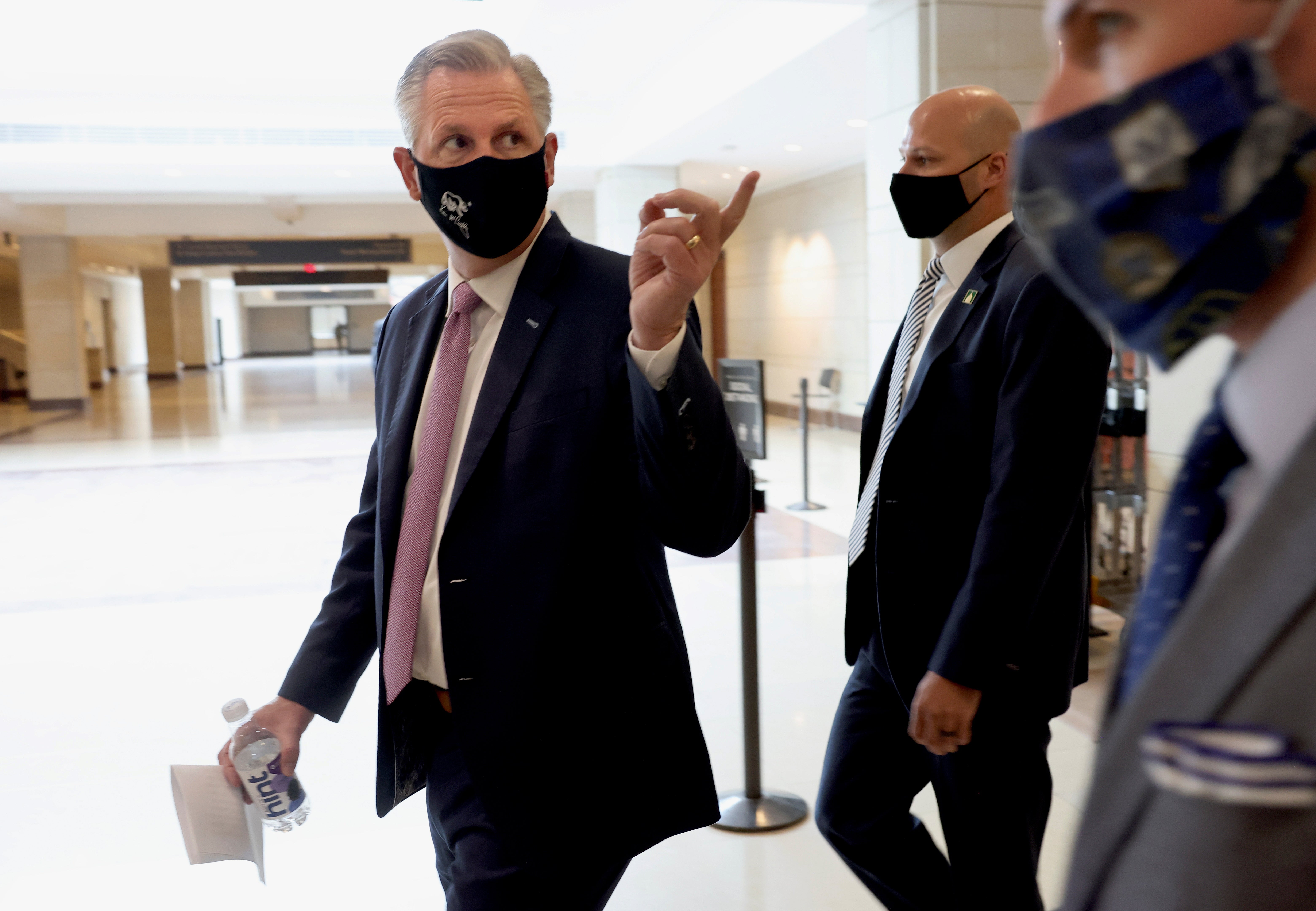 Three lawmakers are to be fined for not wearing a mask on the House floor