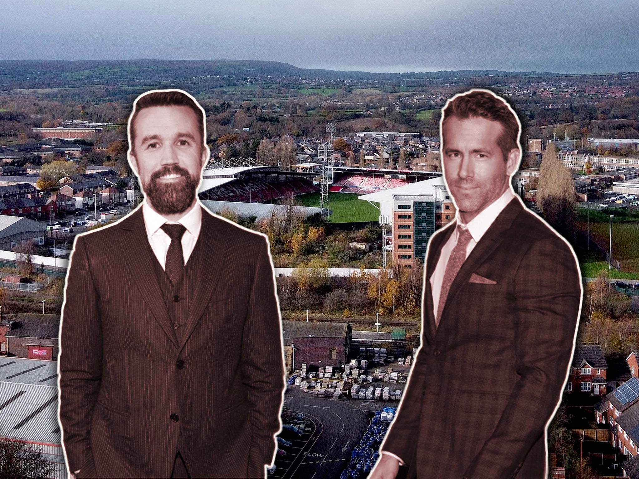 Firing up the Red Dragons: new owners Rob McElhenney (left) and Ryan Reynolds, with Wrexham’s Racecourse Ground behind