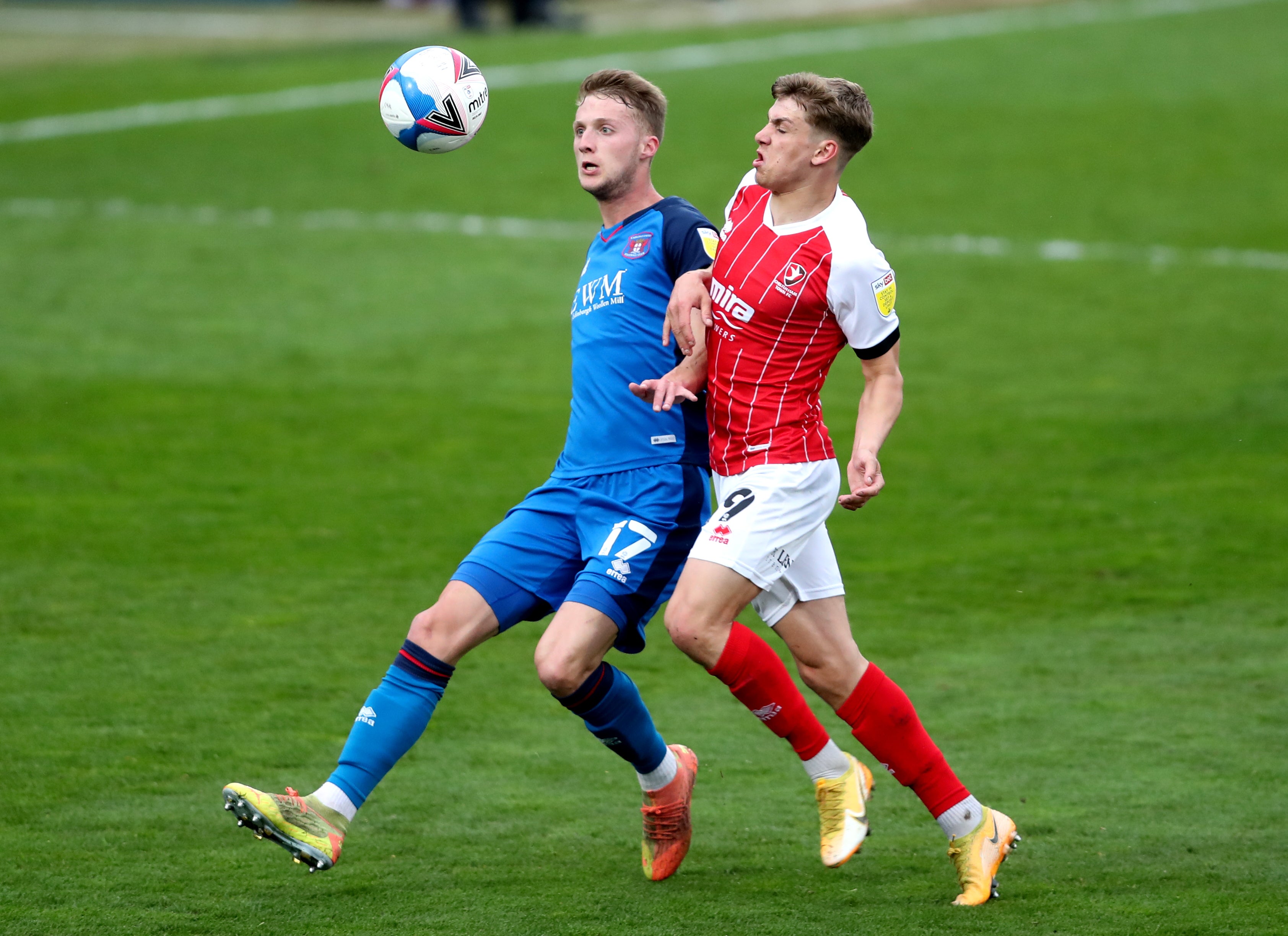 Carlisle defender Jack Armer, left, will remain at Carlisle until at least the summer of 2023