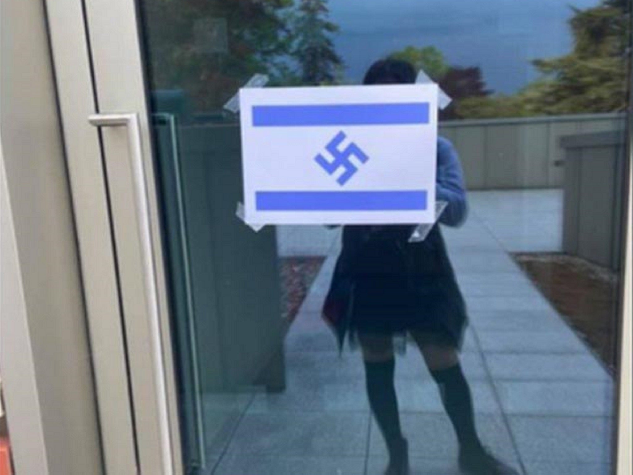 Police are investigating after posters of the Israel flag featuring a swastika were put up at Royal Holloway, University of London