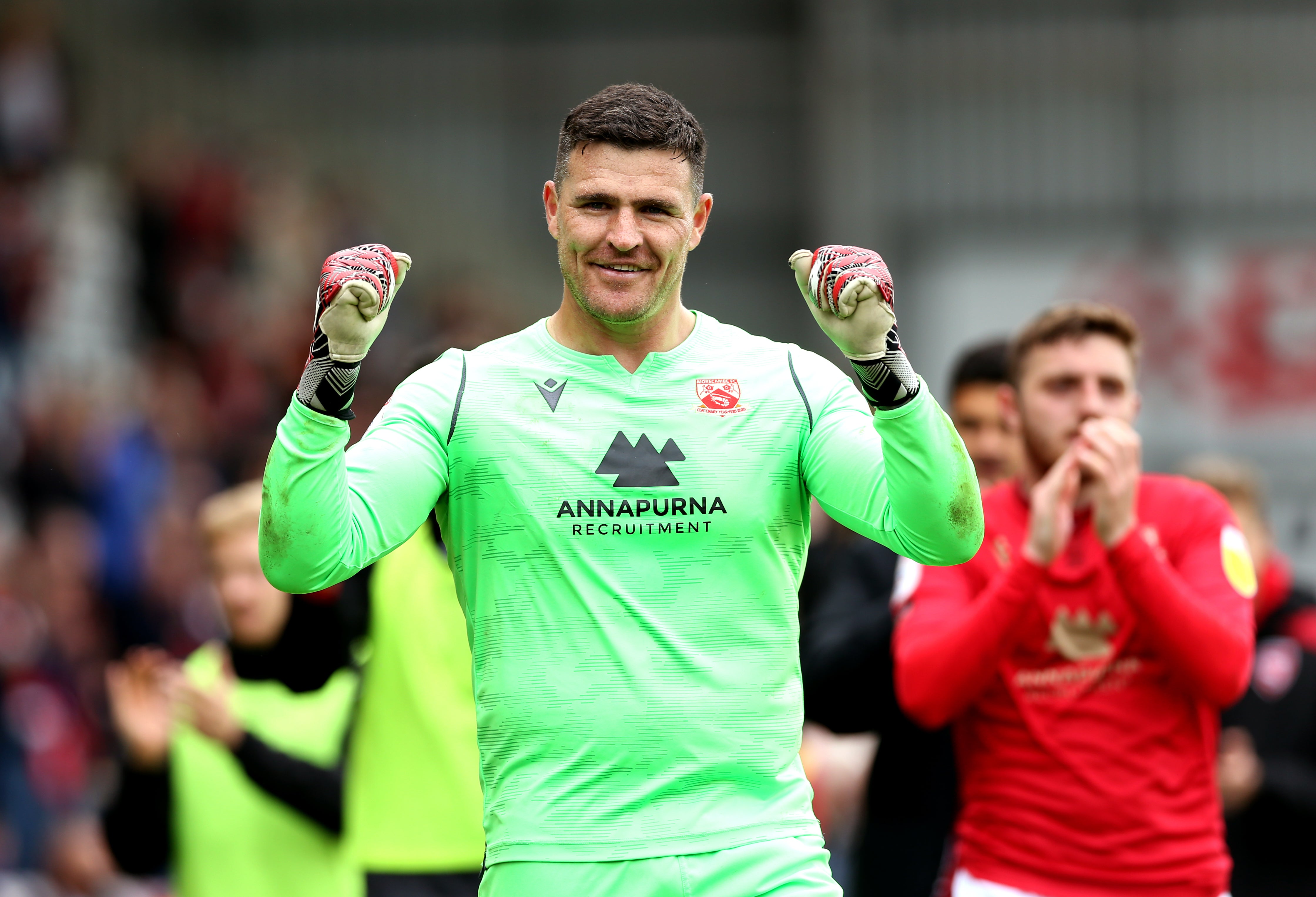 Morecambe celebrate reaching the League Two play-off final