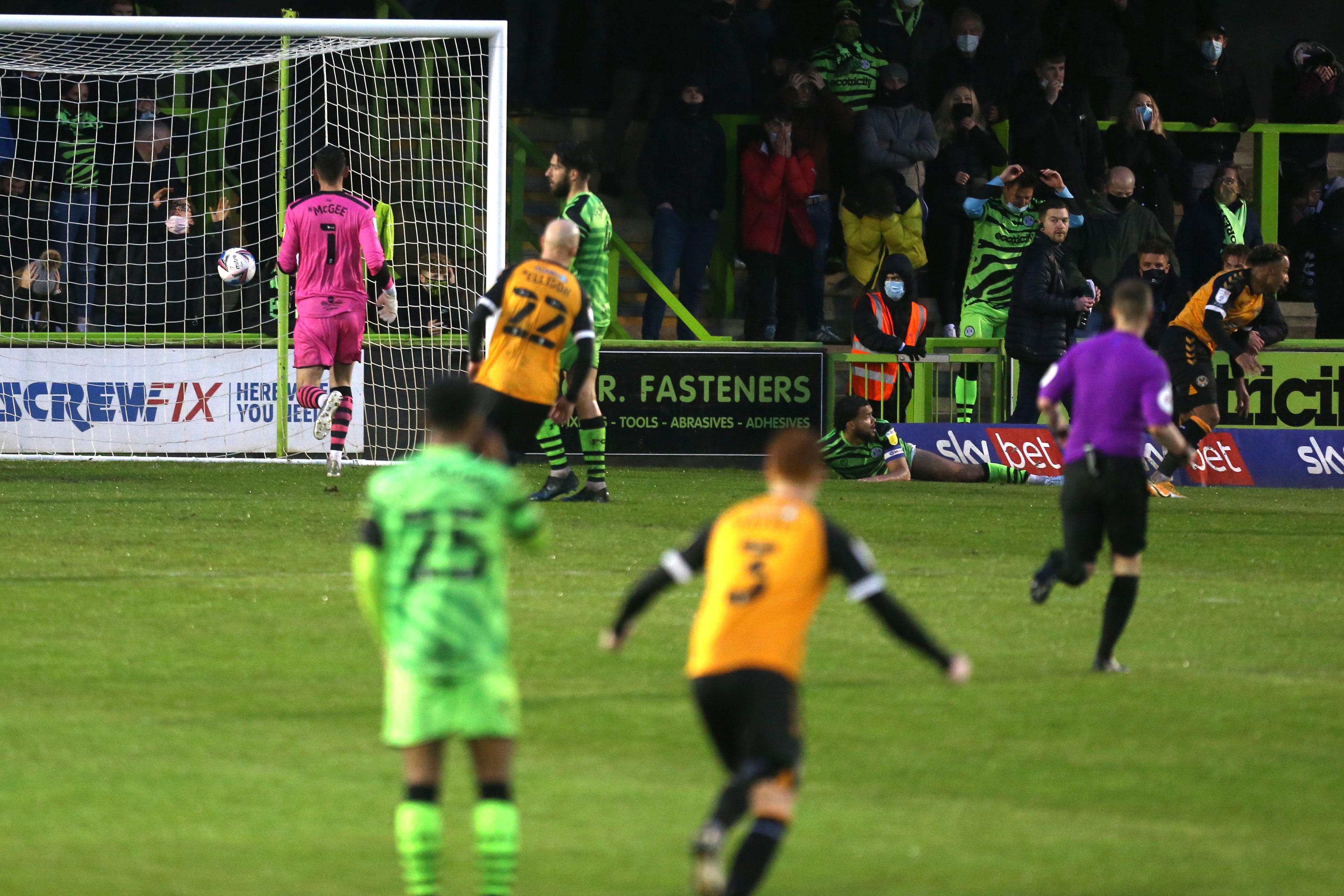 Nicky Maynard, far right, wheels away after scoring Newport's winner