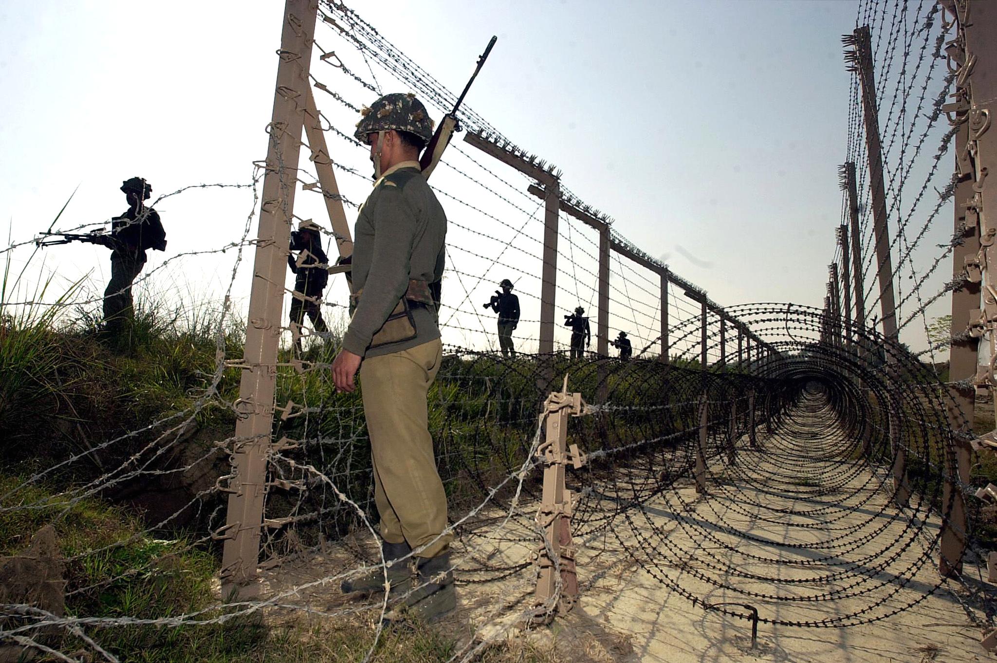 Border Security Force troopers patrol near the Line of Control that divides Indian and Pakistani Kashmir in 2001