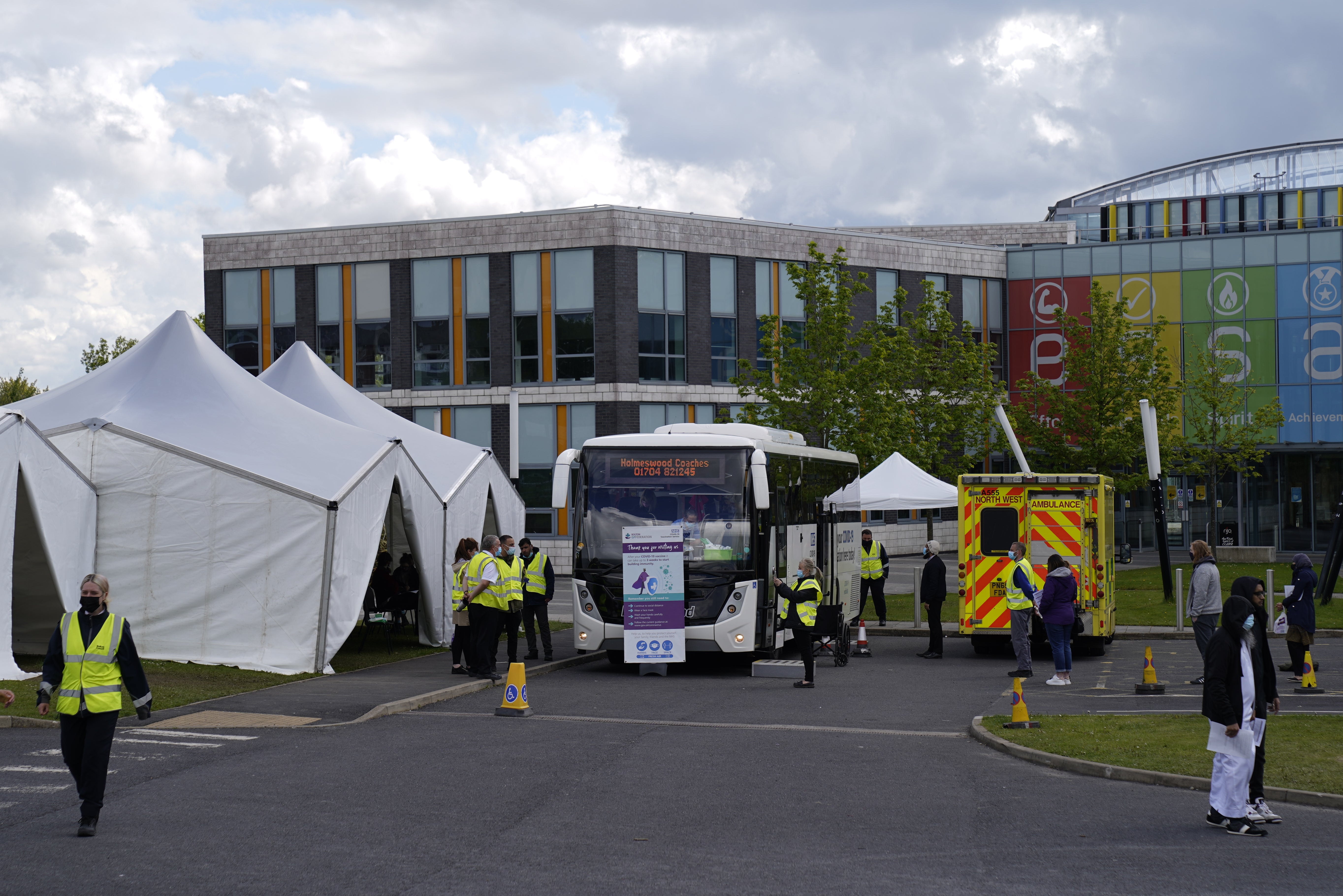A mobile vaccination centre is pictured at ESSA academy in Bolton, England.