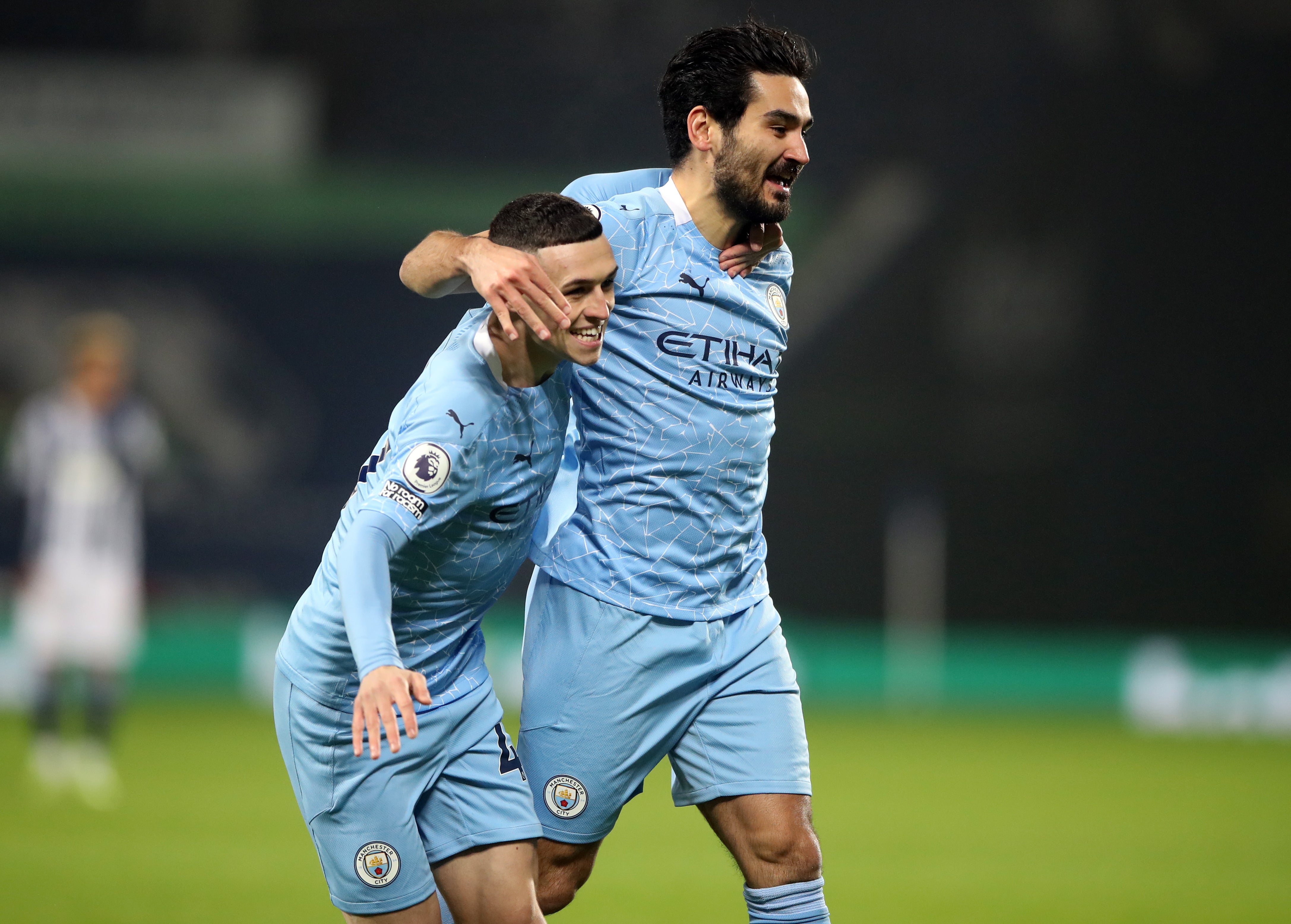 Ilkay Gundogan, right, has been impressed by Phil Foden's form this season