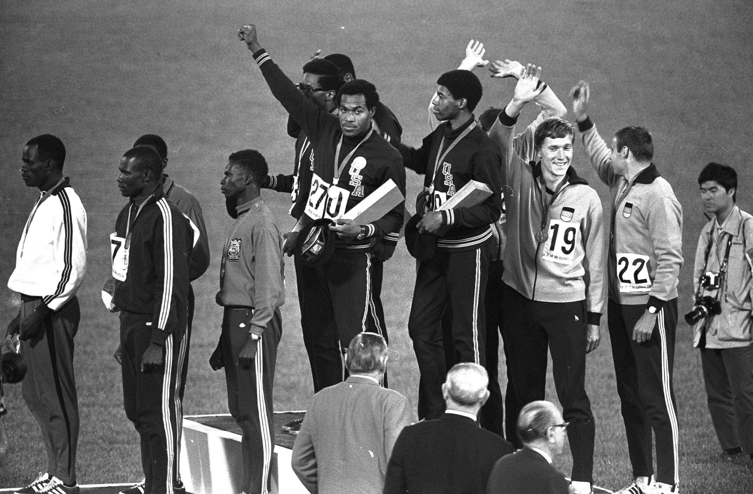 Evans after receiving his medal for the 4x400m relay in 1968