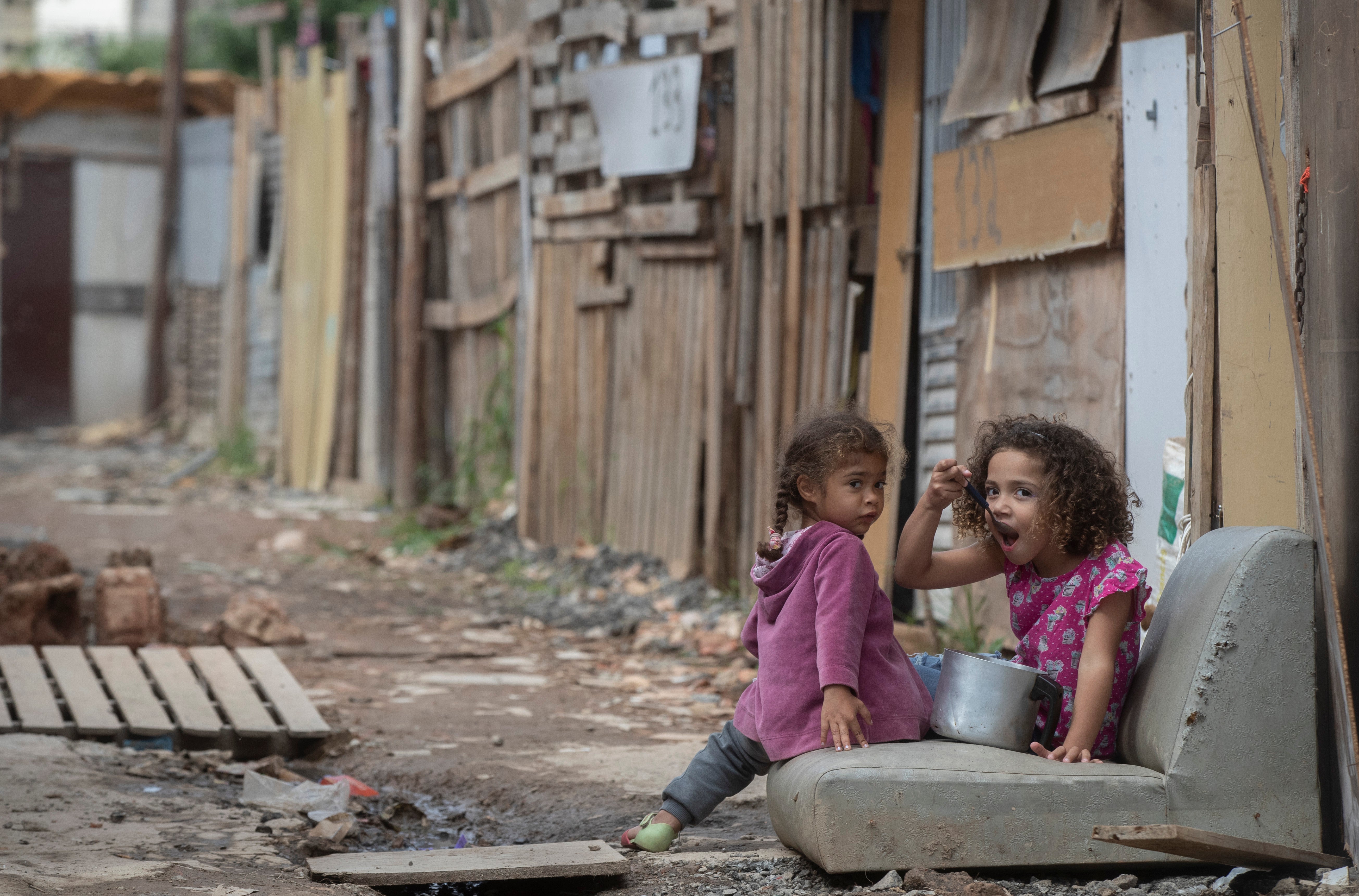 Virus Outbreak Brazil Poverty Comeback