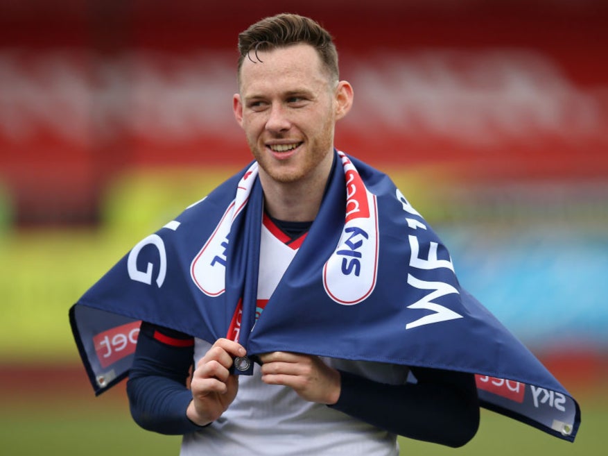 Gethin Jones of Bolton Wanderers celebrates promotion