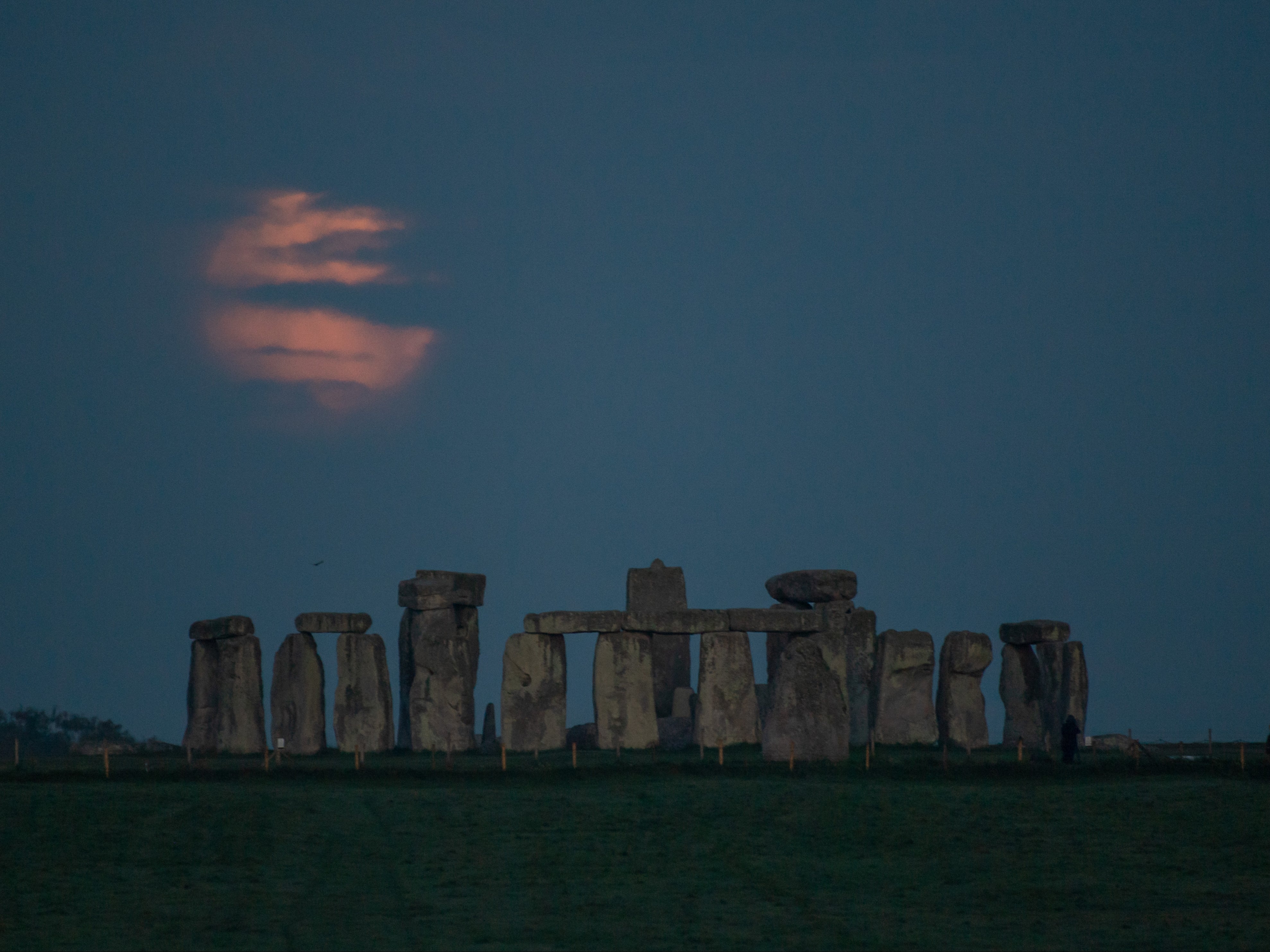 The ‘flower moon’ sets over Stonehenge on 26 May 2021