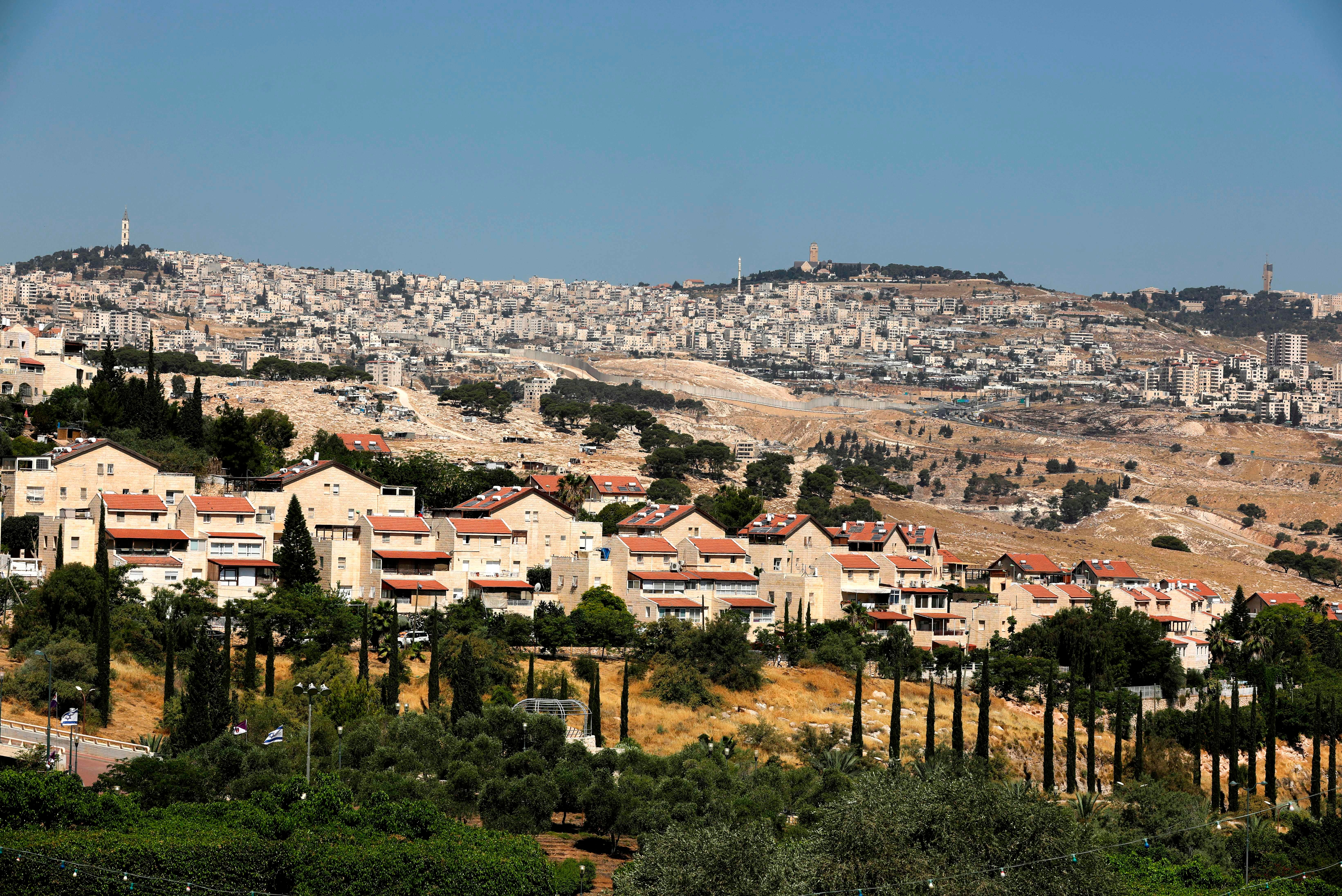 Maale Adumim, Israel’s largest settlement in the occupied West Bank, is shown in the foreground on 1 July 1, 2020.