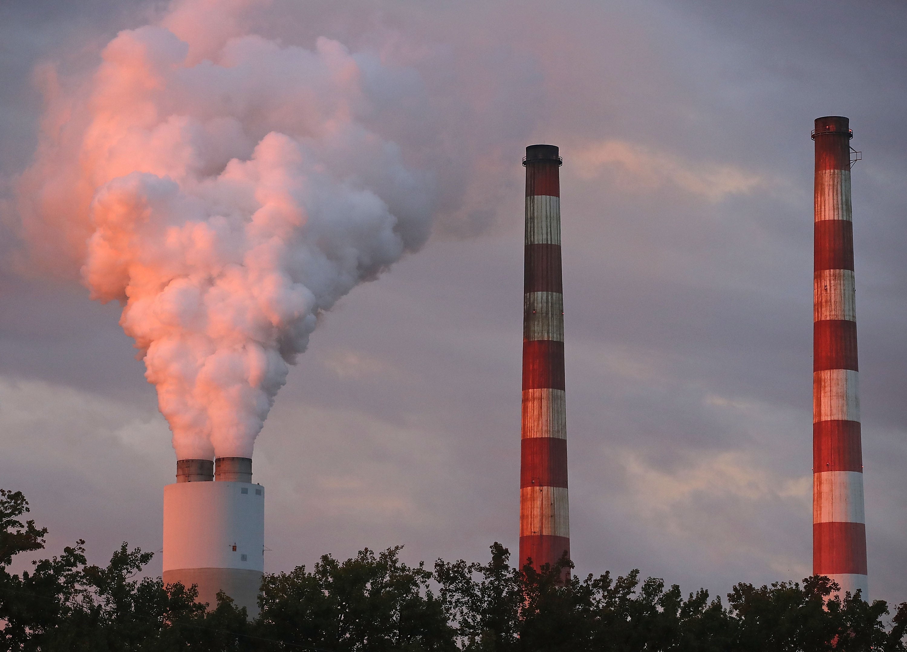 Emissions spew out of a large stack at the coal-fired Morgantown Generating Station on October 10, 2017 in Newburg, Maryland.