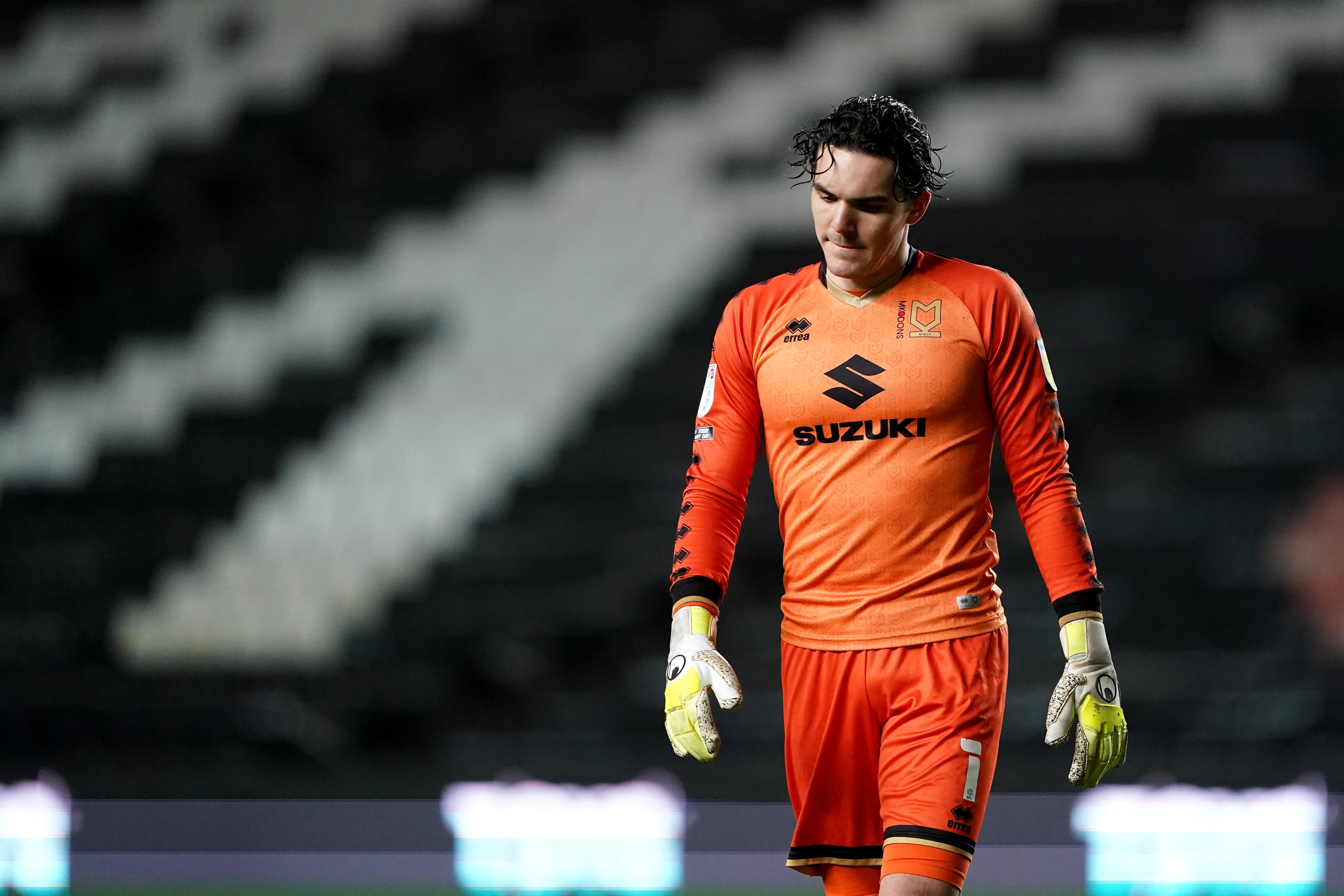 MK Dons goalkeeper Lee Nicholls in action