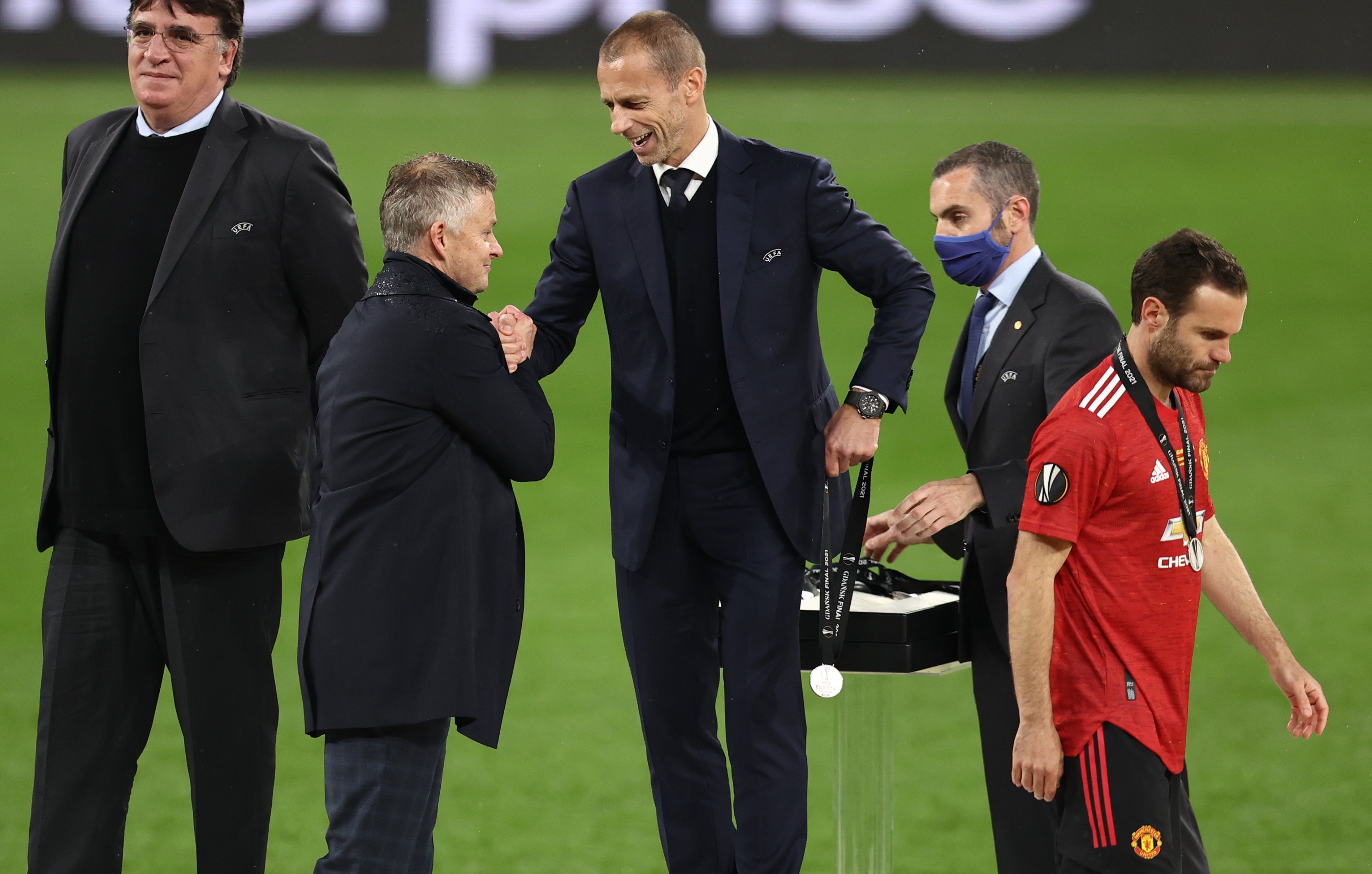 Aleksander Ceferin embraces Ole Gunnar Solskjaer after the Europa League final in Gdansk