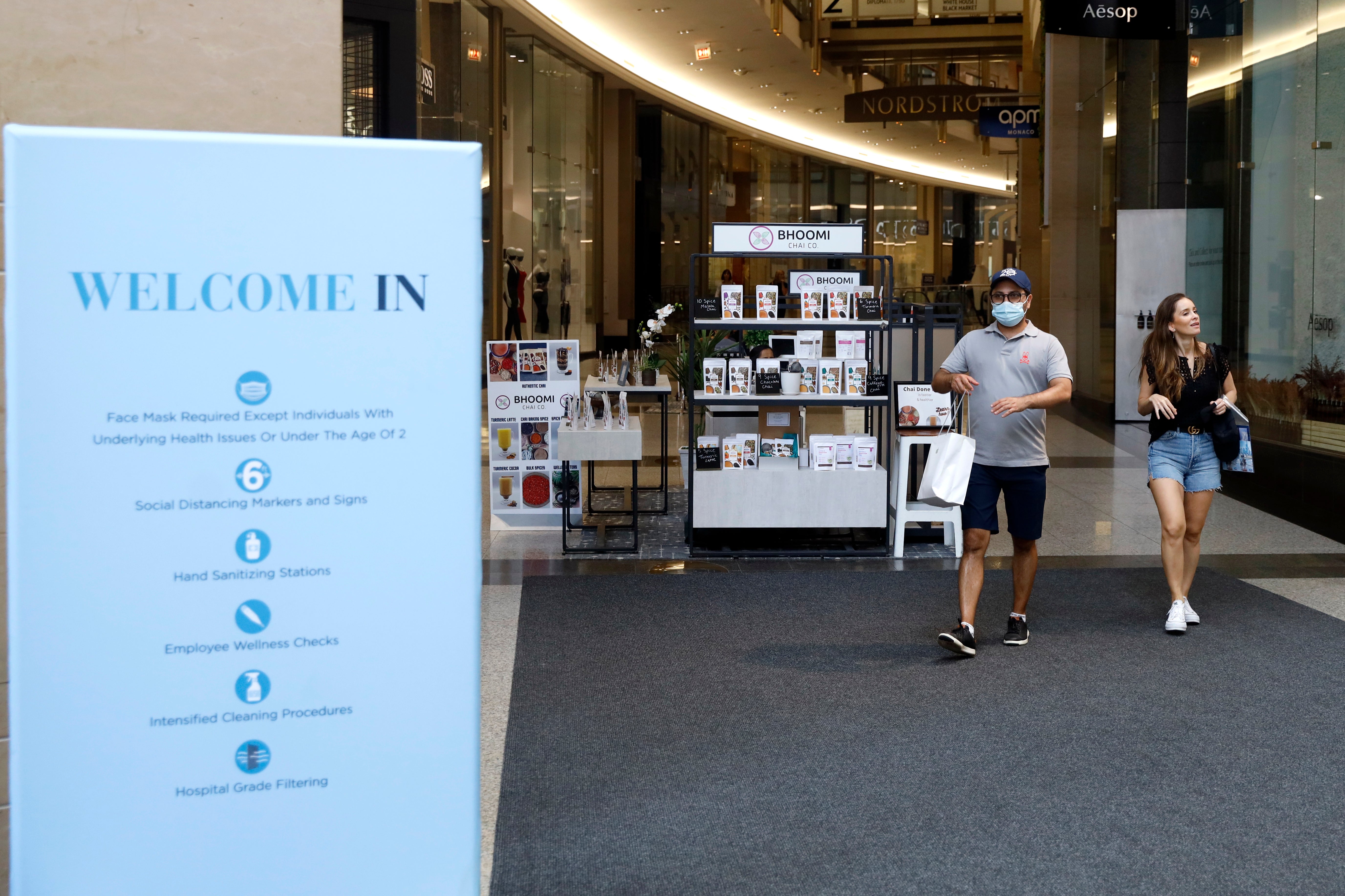 Shoppers Return to stores