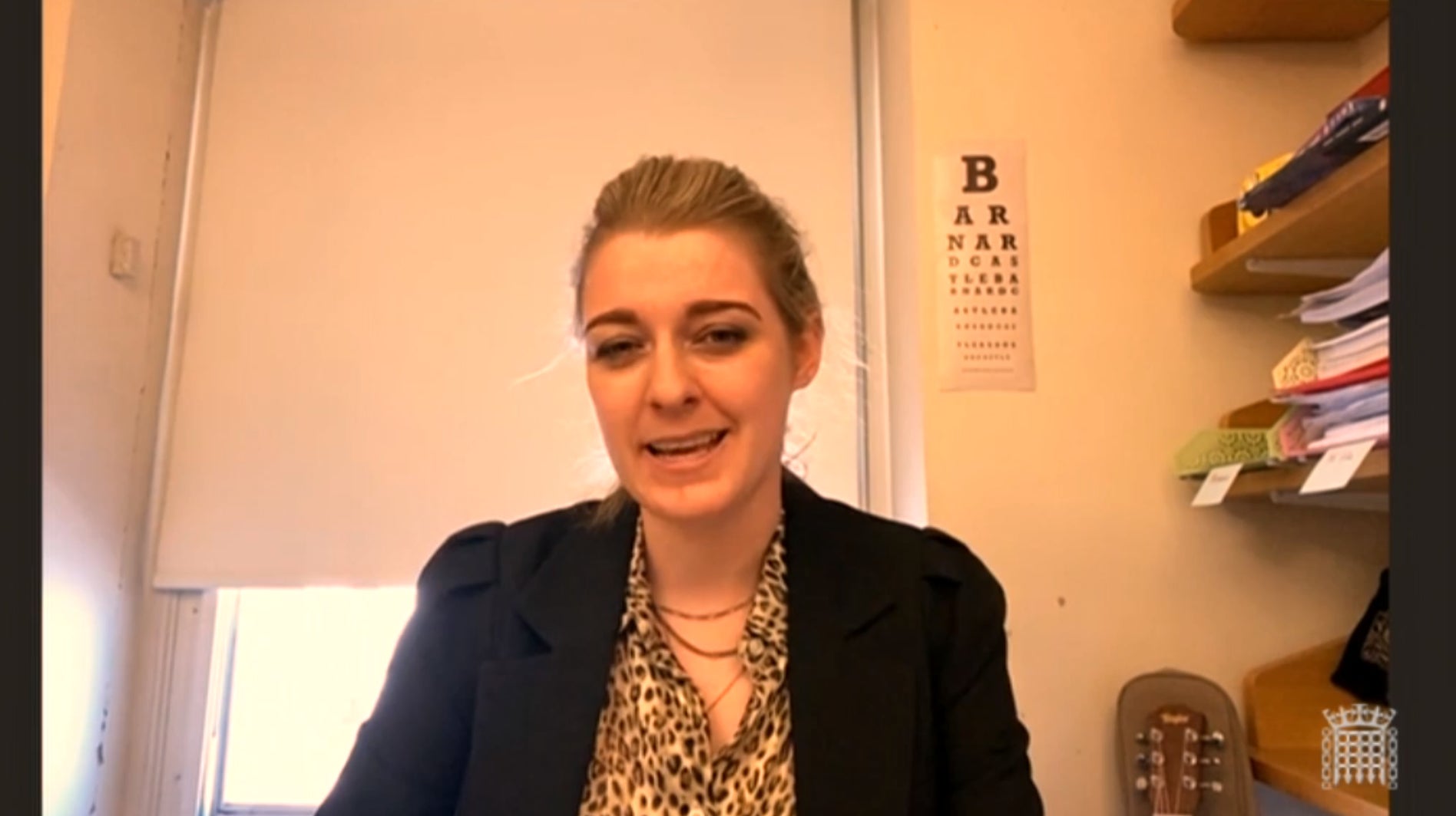 A screen grab from Parliament TV shows Conservative MP Dehenna Davison with a Barnard Castle eye test chart in the background.